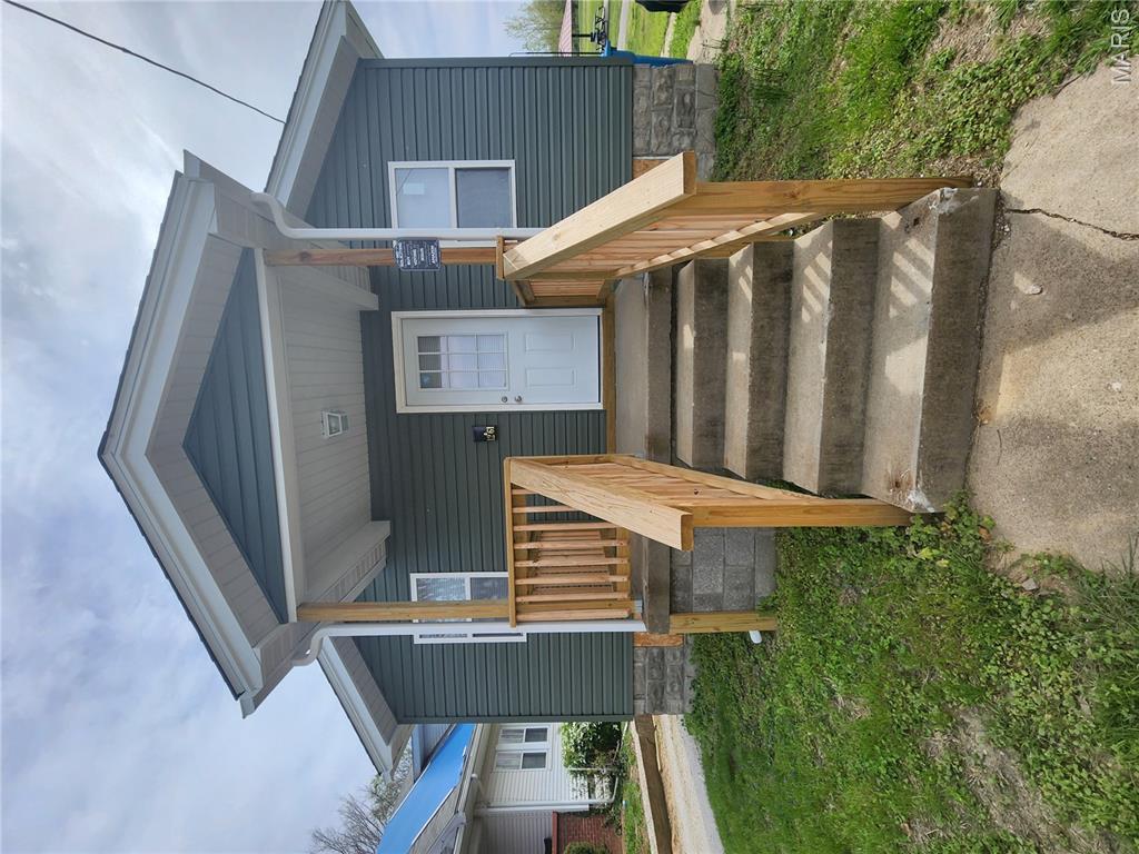 This charming, fully remodeled 1 bedroom, 1 bath home lives larger than it appears, offering a bright and open feel throughout.  The home features convenient main-floor laundry, stylish quartz countertops, and stainless steel appliances that will remain with the property.  Everything is newly updated.  Rehab completed in 2025 includes a new roof, plumbing, electric, HVAC system, siding and windows, providing peace of mind for years to come.    Ideally located next to a park and near shopping.   Please submit all offers via easy offer link with a minimum of 24 hour response time.   Tenant rights till 5/31/2027.