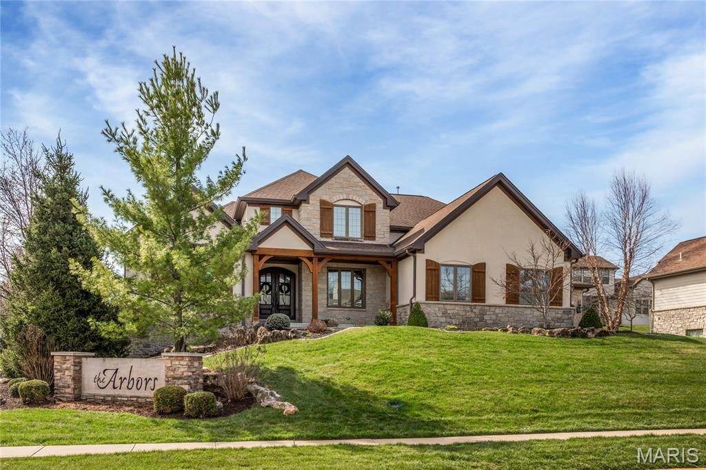 This luxurious 1.5-story home built by McKelvey Homes is ready for its next owner. Featuring over 4,200 square feet, the property includes four bedrooms and 3.5 bathrooms. The interior has been updated with fresh paint, new carpet, and brand-new hardwood floors throughout the main level, including the primary bedroom and closet. The open floor plan is perfect for entertaining and features a gorgeous kitchen with a center island and built-in stainless steel appliances. The great room boasts beautiful vaulted ceilings with interior beams, a stone and stucco fireplace, and large windows that provide an abundance of natural light. The family room includes its own fireplace with built-in bookshelves. Both the study and the primary bedroom feature vaulted ceilings, and the second floor offers a raised loft area complete with a countertop/beverage area. 2 bedrooms share a jack and jill bath with individual vanities. Walk-in pantry. Walk-in Closets. Covered porch w/fireplace. 3 car garage. Open house Sunday, August 16th 12-2pm.