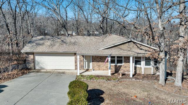 This well-maintained home offers numerous updates and versatile living spaces throughout. The updated eat-in kitchen features custom cabinetry, granite countertops, and ample storage. Hardwood flooring highlights the dining room, adding warmth and character.

The primary suite provides private access to a covered deck through French doors and includes an updated bath with a jacuzzi tub and extensive tile work. Three bedrooms, two baths are located on the main level, allowing for convenient one-level living.

Outdoor enjoyment is enhanced by a three-tiered composite deck overlooking the backyard. The finished walk-out lower level offers a spacious recreation room with gas fireplace, fourth bedroom, half bath, and generous storage space.

Recent improvements include a newer driveway, windows, roof, HVAC system, water heater and additional updates, providing added value and peace of mind. New sewer lateral and radon system. Property is being sold as-is. Back on market due to no fault of seller. It was a contingent contract that did not work out.