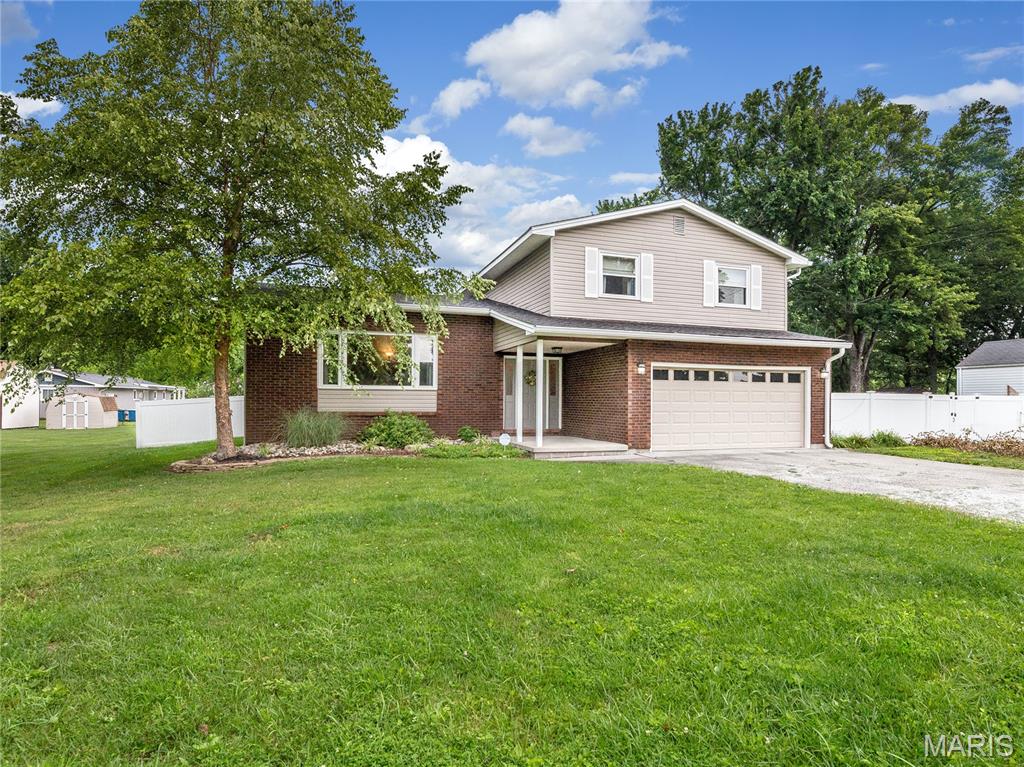 Showings start Monday, June 29th.
Welcome home to this spacious tri-level home located in unincorporated Collinsville within TRIAD SCHOOL DISTRICT! 
Home offers 4 bedrooms and 2-1/2 bathrooms. Living room is spacious and features a large window letting in natural light. Formal dining room for gatherings and special occasions. Kitchen is large and provides room for breakfast area. Major updates include HVAC and Hot Water Heater. Upstairs you will find 4 bedrooms and 2 bathrooms. Primary suite features its own full bath and large walk in closet. Step outside onto the maintenance free deck to enjoy the LARGE, PRIVACY FENCED back yard. Two car garage and storage shed for extra storage. Located in unincorporated Jarvis Township with the benefit of Triad Schools, this home combines space and value! Sq. Footage is approximate and not guaranteed.