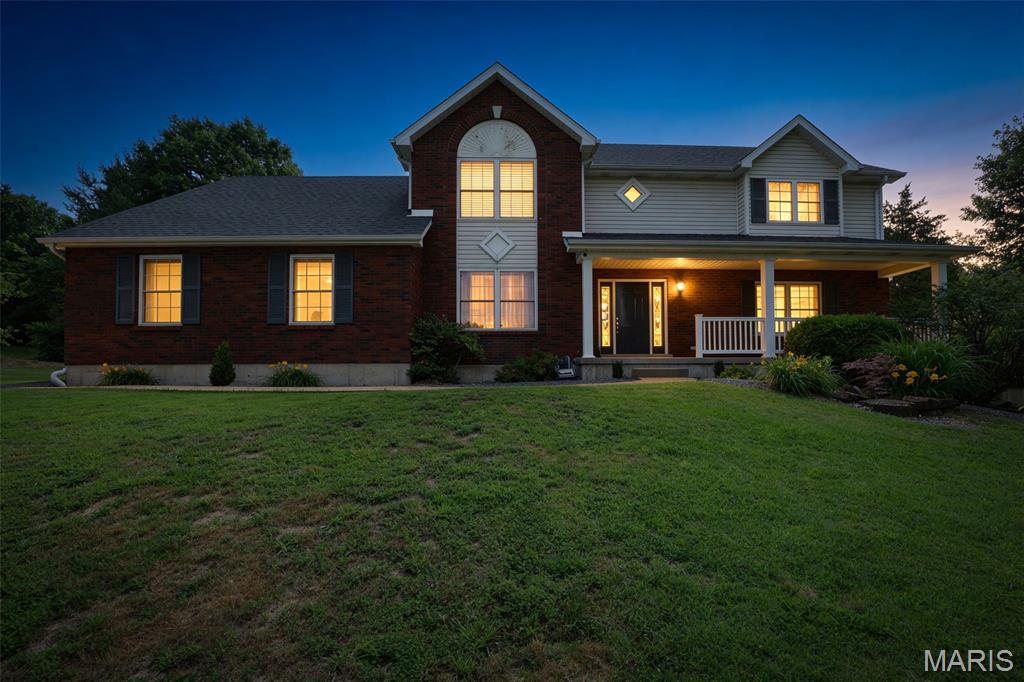 Luxury atrium ranch home located in the highly desirable Lake Estates at Crystal Highlands, situated on a 1.13-acre wooded lot in a quiet cul-de-sac setting. This beautifully and meticulously maintained 4 bedroom, 4 bathroom home offers an open and inviting floor plan with high ceilings, a gas fireplace, and a stunning wall of atrium and palladium windows showcasing spectacular views and abundant natural light. 

The custom kitchen features 42" white cabinetry, granite countertops, stainless steel appliances, center island, built-in desk area, walk-in pantry, and a bay window. It flows seamlessly to the living room—ideal for entertaining and hosting. A formal dining room adds to the additional functionality and space that this gem offers. The main level also includes a spacious primary suite with private bath, first-floor laundry located in the mudroom, and convenient main-floor living.

Upstairs, you’ll find three generously sized bedrooms with ample closet space and a full bath. The finished walkout lower level offers additional recreational space, a bonus room, a full bath, and access to the side patio. Recent updates include a new roof and new flooring throughout. Additional highlights include a newly enclosed sunroom with sink, expansive outdoor space, and subdivision lake access. Located just minutes from Crystal Highlands Golf Course and a short trip into town, this home combines luxury, privacy, and community living in one exceptional offering.