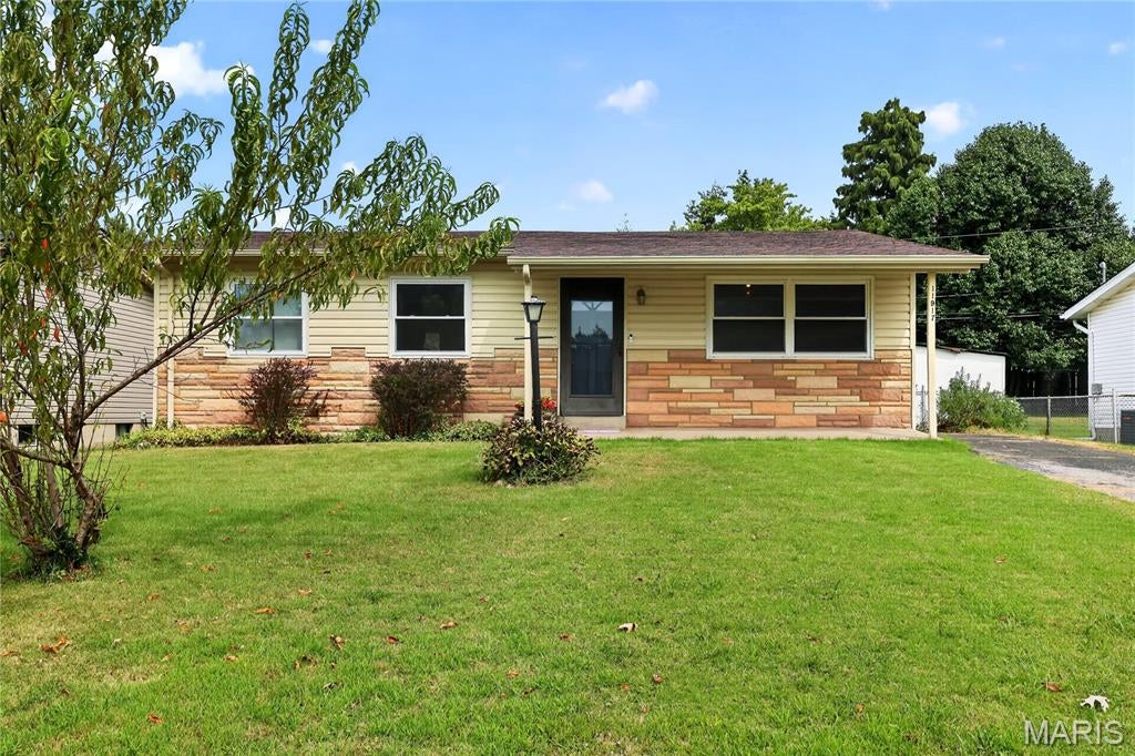 Welcome home to this charming 3-bedroom, 1.5-bath home in the award-winning Pattonville School District! This home is an incredible opportunity to make homeownership a reality in today’s market. Step inside to a bright and inviting living room filled with natural light. The living room flows seamlessly into the dining area which features a sliding glass door leading directly to the backyard and perfect for everyday living and entertaining. The spacious kitchen offers plenty of cabinet space, a sink overlooking the backyard, and ceramic tile backsplash. The primary bedroom features its own updated half bath for added convenience. Outside, you’ll love the large, level, fully fenced yard with plenty of room to play, garden, entertain, or simply enjoy the outdoors. A storage shed provides extra space, while three peach trees and an apple tree add a fun and unique touch to the property! Head downstairs to find even more living space with a spacious rec room that could easily serve as another living room, home office, workout space, theater or a bonus room for whatever fits your lifestyle. With 3 bedrooms, 2 baths, multiple living spaces, a fantastic fenced yard, and a hard-to-find price point, this home offers so much opportunity. Don’t miss your chance to make it yours!