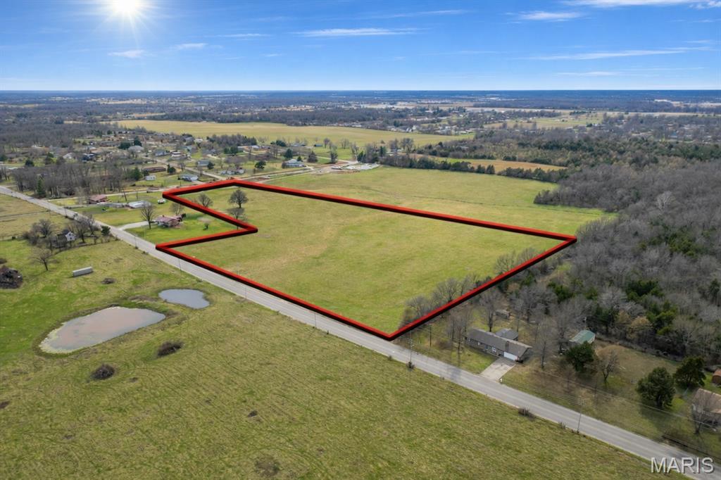 Located in Lebanon, this exceptional 15-acre tract offers a rare in-town development opportunity directly adjacent to the city’s newest park. Positioned for maximum appeal, the property is ideal for a residential subdivision, townhomes, or an apartment complex, combining convenience with lifestyle-driven amenities. With easy access to utilities, paved roads, schools, shopping, and healthcare, the site is perfectly suited for modern housing needs. The park like setting adds significant value, providing green space, walking trails, and recreation just steps away—an increasingly sought-after feature for buyers and renters alike. Lebanon’s steady growth, strong local economy, and ongoing investment in infrastructure make this property a prime candidate for long-term success. Whether you’re planning a single-family community or a multi-family development, this tract delivers the location, size, and potential to bring your vision to life.