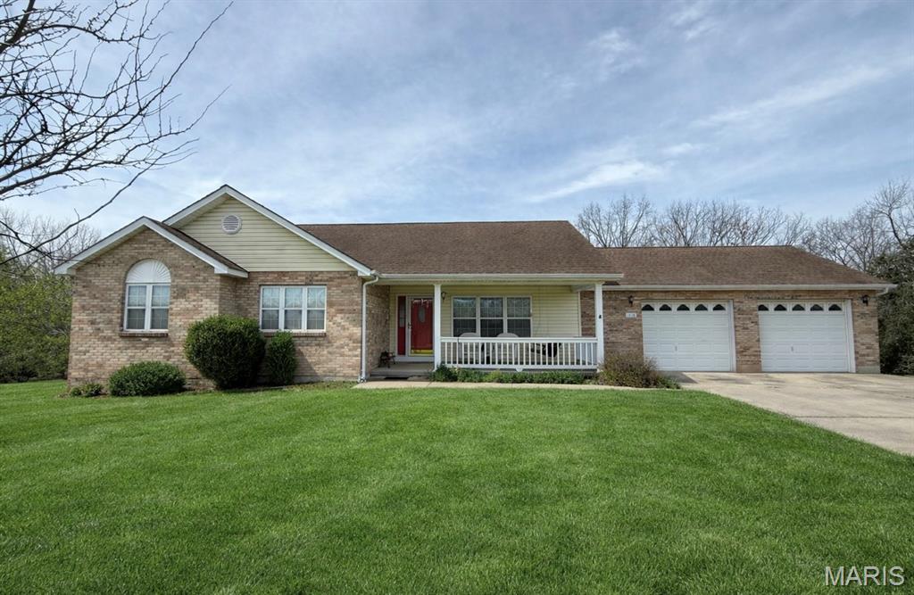 This beautifully maintained home features 3 bedrooms and 2 bathrooms on the main level, plus an addition bedroom and bathroom in the finished walk-out basement. The kitchen offers plenty of counter and cabinet space for someone who loves to cook! The spacious master suite includes a walk in closet and double-sink vanity in the bathroom. Step outside and enjoy the large deck overlooking for the 3.04-acre lot or hang out on the patio below. Find peace and nature in this quiet setting, located only 5 miles from town!