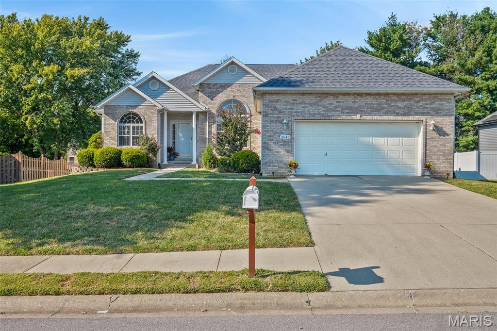 Welcome home to this spacious 4-bedroom, 3-bath home offering a beautiful combination of comfort, functionality, and valuable updates. Step inside to a bright and inviting main living area featuring vaulted ceilings, abundant natural light, and beautiful three-quarter-inch hardwood floors throughout the bedrooms, living room, and dining room/office.

The kitchen features granite countertops updated in 2025, along with new tile flooring that continues into both upstairs bathrooms. The primary suite provides a relaxing retreat with a private en-suite bathroom featuring a double vanity and Jacuzzi tub. Convenient main-floor laundry adds to the home’s functional layout.

The fully finished walk-out basement significantly expands the living space and features built-in details, an additional bedroom, full bathroom, and plenty of room for a family room, recreation area, home office, or guest space. Walk-out access provides easy access to the backyard and creates a seamless extension of the home’s living areas.

This home has also benefited from numerous recent improvements, including a new water heater in 2024, granite countertops, tile flooring, microwave, and roof in 2025, plus a new HVAC system with a 4-ton A/C unit in 2026. The dishwasher was replaced in 2022.

With generous living space, a versatile finished lower level, beautiful hardwood flooring, and extensive recent updates, this home is ready for its next owner. Schedule your showing today!

Buyer to independently verify all MLS information, including but not limited to square footage, room measurements, lot size, taxes, and school district.