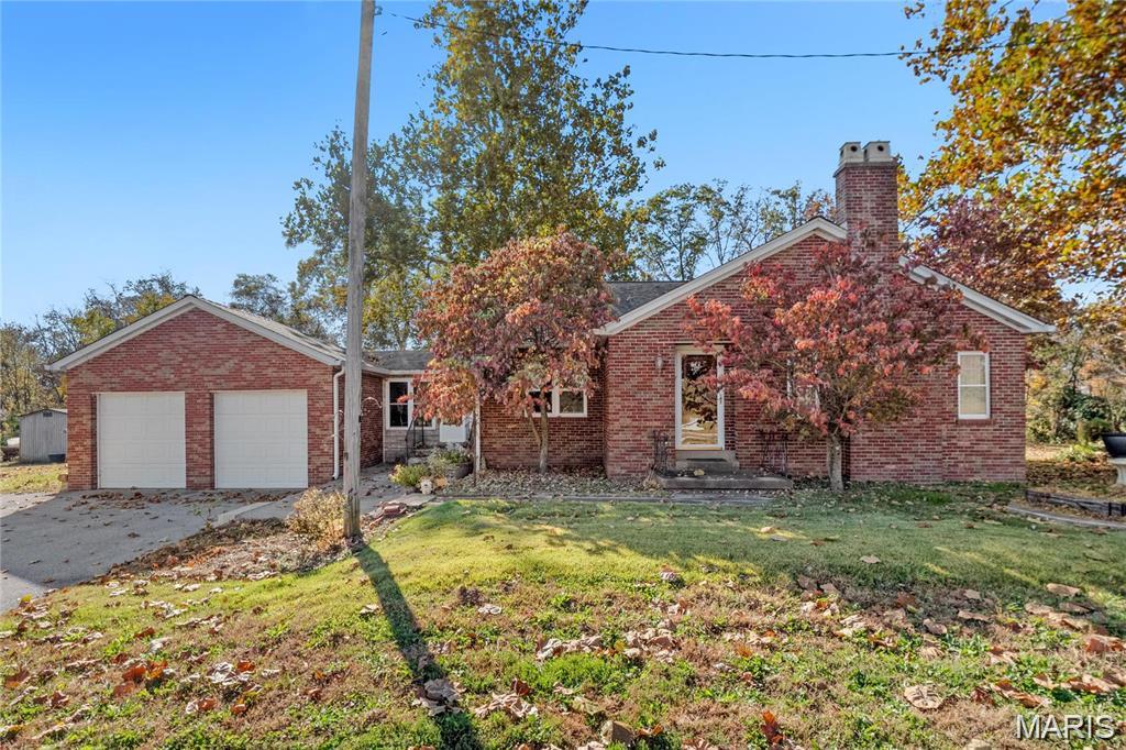 Welcome to this charming 3-bedroom home situated on a spacious corner lot offering both comfort and convenience. The circular driveway with a dedicated turning lane provides easy access and added functionality for everyday living.

Inside, you’ll find two bedrooms conveniently located on the main level, while the upper level features a generously sized third bedroom along with a half bath. The spacious eat-in kitchen offers plenty of room for cooking, dining, and gathering.

Additional highlights include a two-car attached garage, an unfinished basement with abundant storage space, two outdoor storage sheds, and an enclosed breezeway adding extra versatility to the home.

Filled with character and opportunity, this property offers a wonderful blend of space, functionality, and potential for its next owner.