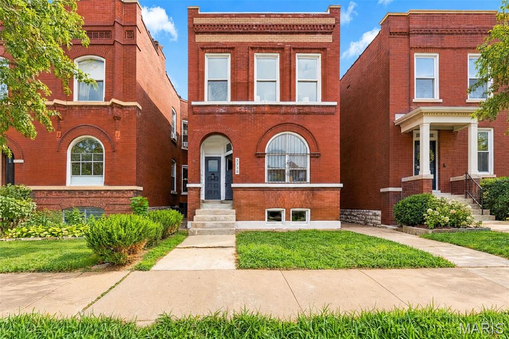 Beautifully updated and move-in ready, this spacious brick home is located in the desirable Benton Park West neighborhood, just off Cherokee Street and surrounded by an exciting mix of local restaurants, shops, and entertainment. This home offers the perfect blend of historic character and modern updates, with generous living spaces and tall, soaring ceilings throughout. The huge chef’s kitchen is a true showstopper, featuring stainless steel appliances, an impressive 60” refrigerator, oversized gas range, and an abundance of cabinet and storage space. Spacious bedrooms provide plenty of room for the whole family, while both bathrooms have been beautifully renovated with custom tile, new fixtures, and modern finishes. Outside, enjoy a large parking pad with room for 2+ cars. A full walkout basement provides excellent additional storage and potential. A fantastic opportunity to own a beautifully updated home in one of South City’s vibrant and sought-after neighborhoods!  Agent Owned.