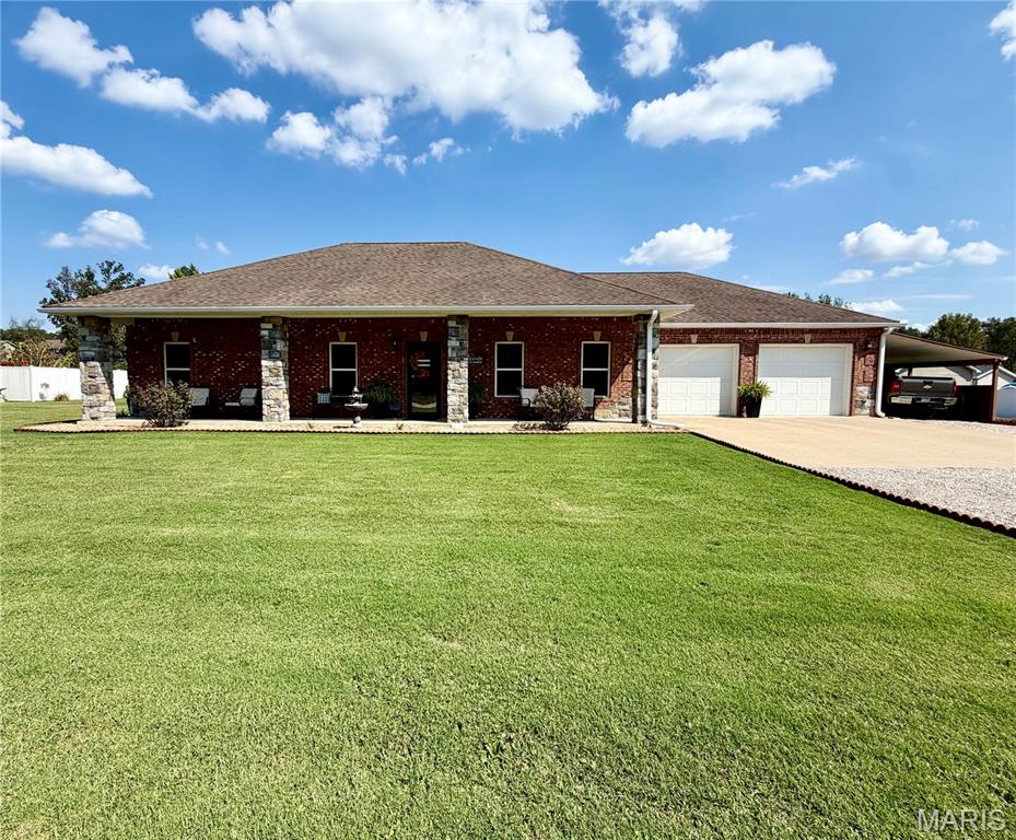 Beautiful and spacious 3-bedroom, 2-bath home featuring an open floor plan and an abundance of thoughtful details. The kitchen showcases custom cabinetry, stainless steel appliances, a convenient island, and beautiful ceramic wood-look flooring that flows throughout the home. The primary bath offers a custom shower and relaxing Jacuzzi tub. Enjoy the elegance of 10 foot, double-tray ceilings, crown molding, professionally tinted windows and architectural shingles. CHA with heat pump provides year-round comfort. Outside, the fenced backyard features a pergola?perfect for relaxing or entertaining.  An oversized 2-car garage, and an attached carport provide additional storage and plenty of parking and space for your boat or recreational equipment. A wonderful combination of style, comfort, and functionality!  Schedule your showing today!