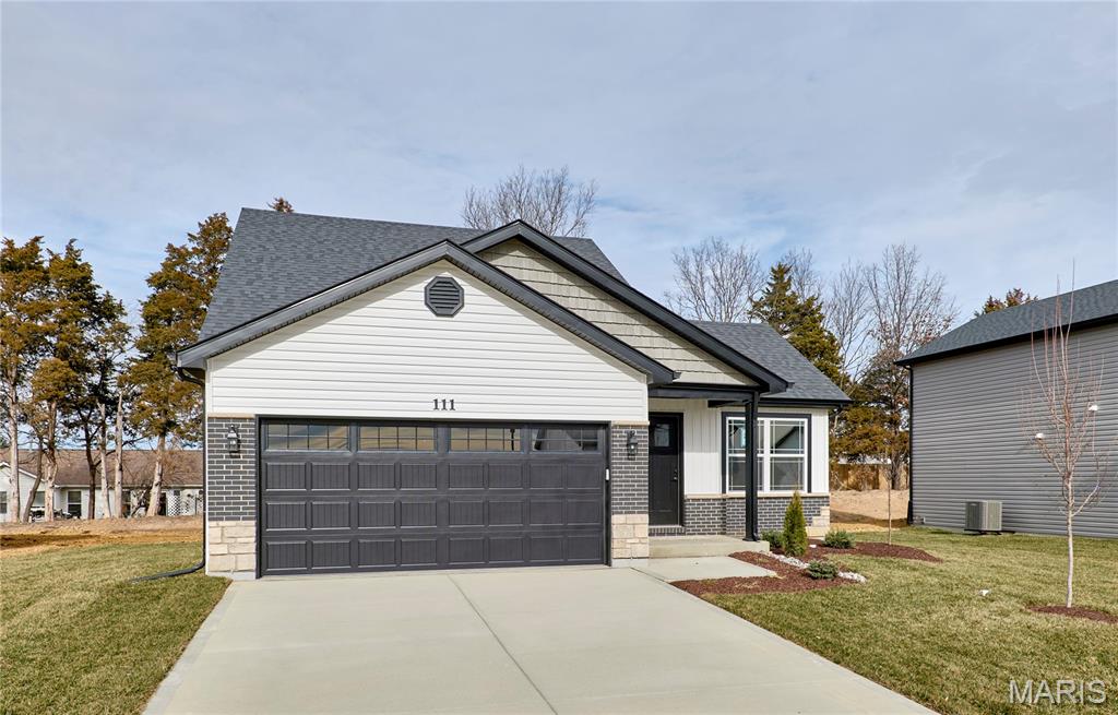BRAND NEW home with every option you could imagine! They include vaulted ceilings, rounded “bullnose” corners, granite or quartz countertops, stainless steel appliances, 42" cabinets with "cushion close", custom neutral-colored paint job throughout, LVT flooring throughout most of the home, framed windows, taller baseboards, adult-sized cabinets in bathrooms with marble countertops, walk-in closets, upgraded carriage garage doors with openers on 2 CAR Garage, full bath rough-in, panel doors (many varieties), and upgraded water/light fixtures throughout the house! Second FLOOR laundry! Fully sodded yard (front/sides/back). *Pictures are of previously built homes. Builder/Broker* This home is USDA eligible.