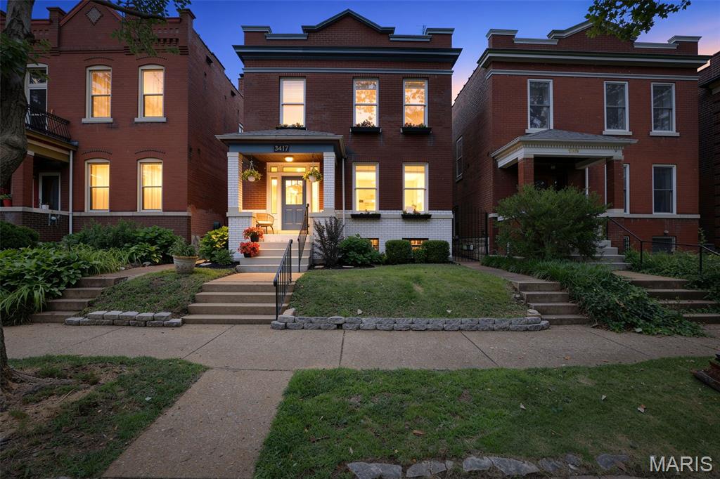 Welcome to this beautifully updated 1911 historic home at 3417 Humphrey Street, offered at $435,000. Blending turn of the century character with modern city convenience, this three bedroom two and a half bathroom residence sits in an unbeatable location with friendly neighbors and walkability to both Tower Grove Park and the vibrant South Grand dining district. Step inside to discover the historic charm of original harwood floors, stained glass, and exposed brick seamlessly merging with beautiful design and comfort throughout. The main floor boasts a bright and welcoming open-concept that connects the livingroom and diningroom, making it the perfect central hub for entertaining or relaxing.  This open floor plan flows into the kitchen that makes entertaining easy with an island and custom pantry.  Additionally, the first floor has a versatile bonus space along with a bathroom perfect for daily use and guests.  Upstairs the master suite serves as a peaceful retreat, boasting a walk-in closet and an attached bath with a double sink vanity. There are two other spacious bedrooms upstairs with ample closet space, another updated full bathroom, and a convenient second floor laundry. The basement offers plenty of storage or workout space! Outside, the property hosts a fully enclosed flat backyard paired with a secure detatched garage.  Zoned heating and cooling, closets galore, a kitchen pantry, second floor laundry, off-street parking, and flawless design - this house has it all. Don't miss this opportunity to see this masterpiece.