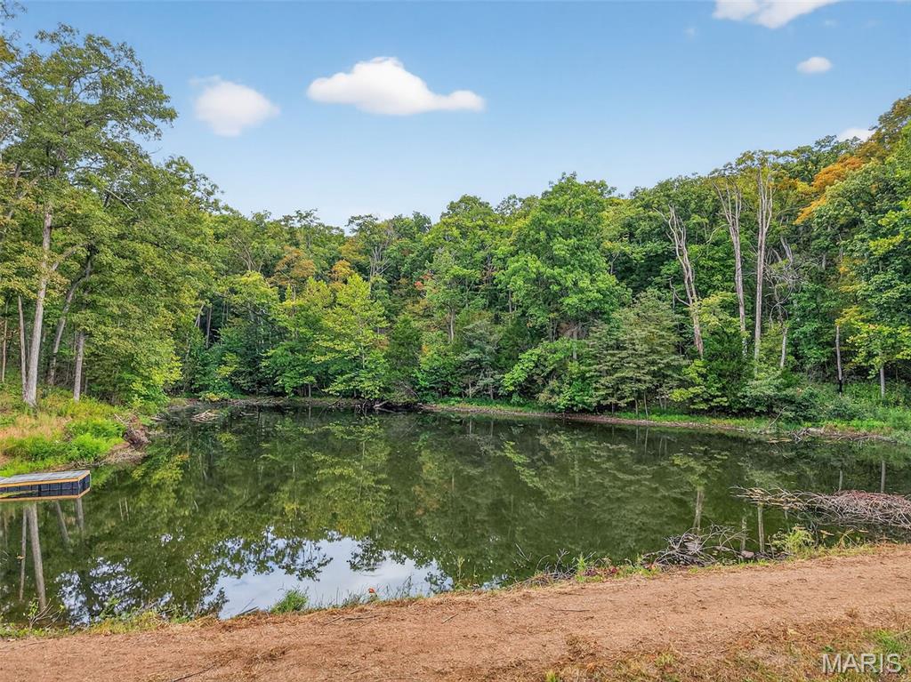 Beautiful 18.21 Acres with pond and pavillion located in Warren County. Excellent opportunity for those looking to build their dream home or retreat, invest in a recreational area, or simply own a piece of tranquil Missouri landscape.