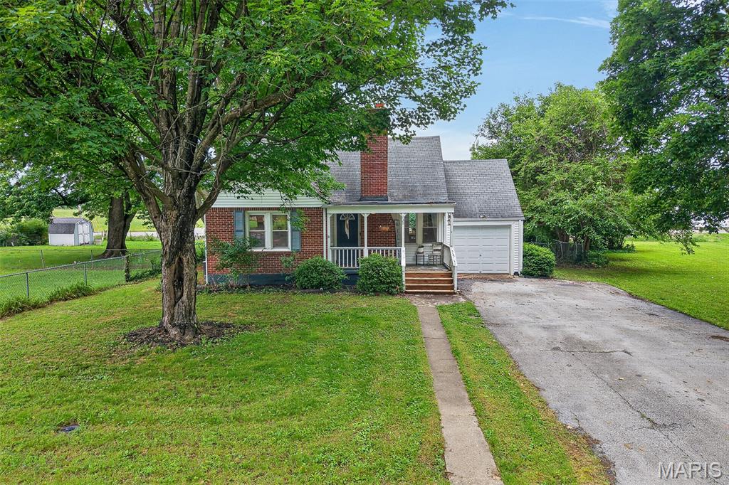 Charm, character, and space come together in this beautiful 3-bedroom, 2 full-bath home situated on over half an acre across two lots within the city limits! From the moment you step inside, you'll appreciate the timeless appeal of the original hardwood floors, spacious living room, separate dining room, and additional family room offering plenty of space to gather and entertain. The kitchen features ample cabinet storage, while the attic bedroom and full bathroom add unique charm and versatility. This gem offers newer windows, and the full basement provides abundant storage. Outside, you'll fall in love with the space, mature shade trees, fenced backyard, wonderful deck, and peaceful setting in a private, established neighborhood. This property is truly one of a kind, blending quaint character with functional living space. Don't miss your opportunity to own this distinctive home schedule your showing today!