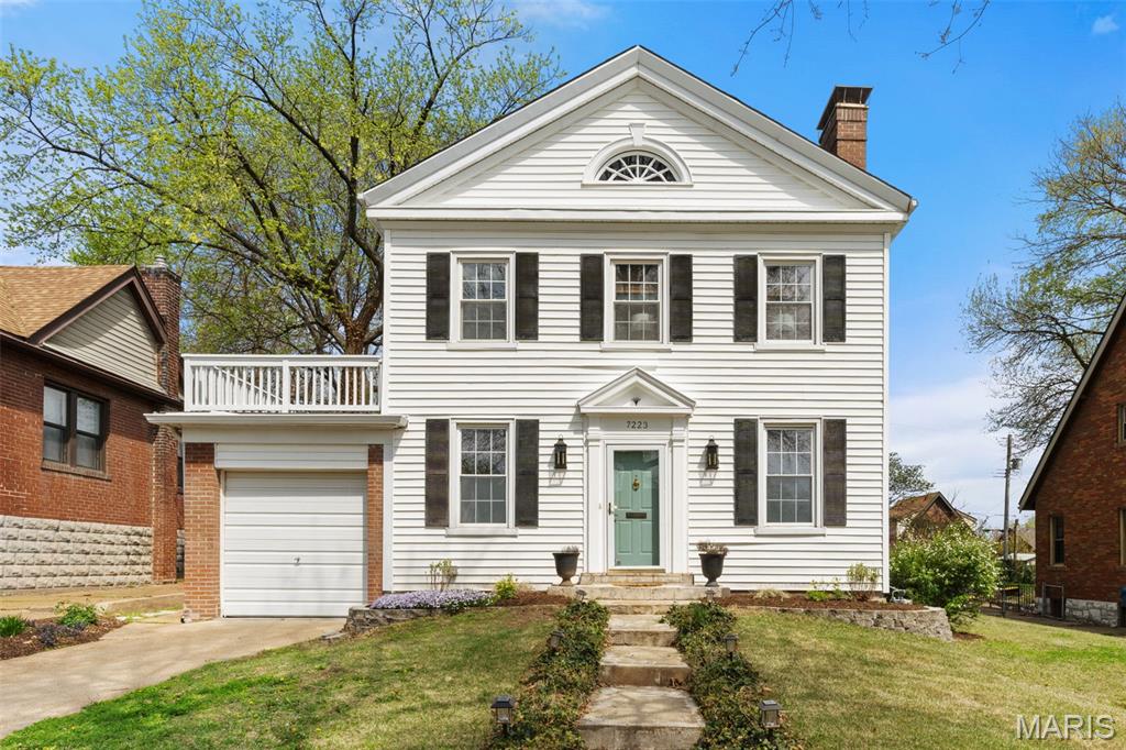 Loaded with charm and character, this spacious two-story home in the heart of University City offers the perfect blend of classic architecture and thoughtful modern updates. Ideally located near local parks and the vibrant shops and restaurants of The Loop, this home combines convenience with timeless appeal.

Upon entry, you’re welcomed by a large living room featuring a cozy wood-burning fireplace, creating an inviting space for gathering and relaxation. The separate formal dining room is perfect for hosting memorable dinners, while the updated kitchen showcases stainless steel appliances, stylish countertops with tile backsplash, and refurbished cabinetry. A den or study provides the ideal setting for a home office or reading nook, and the sunroom addition fills the home with natural light, offering seamless access to the spacious private patio overlooking the beautifully fenced backyard—perfect for entertaining or enjoying peaceful outdoor moments. A convenient half bathroom and attached one-car garage complete the main level.

Upstairs, you’ll find three generously sized bedrooms, all featuring gorgeous hardwood flooring. One bedroom includes an attached bonus room, ideal for a nursery, sitting area, or additional workspace. Additional highlights include a walk-in closet in the primary bedroom and an upper deck that provides a unique outdoor retreat.

The partially finished lower level expands the living space with a versatile recreation and entertainment area, and ample storage space. Outside, the backyard offers endless gardening opportunities along with a storage shed and utility work area.

Nestled in a quiet neighborhood, this home beautifully blends contemporary updates with old-school charm.