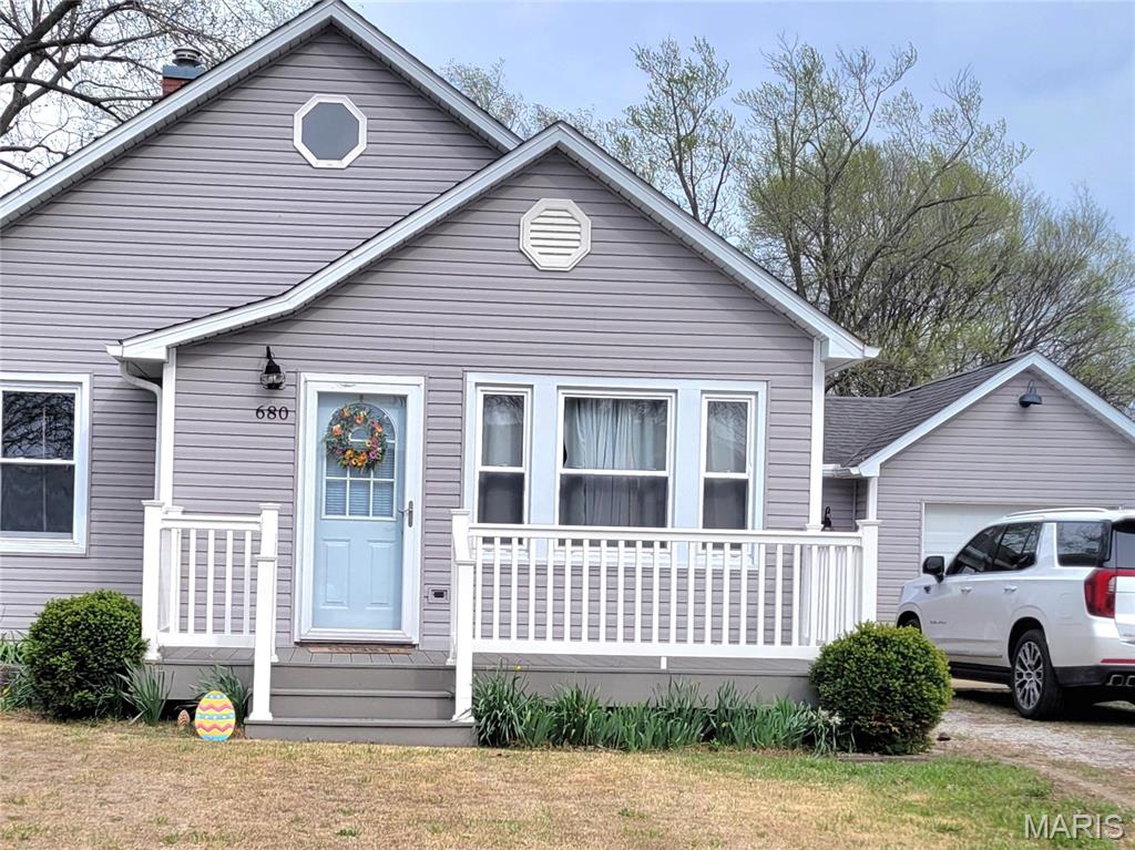 Nice starter home with all appliances staying, with new washer. Home is in New Minden, so centrally located.  2BR 1BA with lots of hardwood flooring. Large living room, gally kitchen has pantry and lots of storage. Bonus room off kitchen for more storage and makes great mud room connecting to garage.  Nice covered patio off the back for relaxing in the evening. Basement has been waterproofed by Woods basement and has sump pump and dehumidifier.  AC new in 2020 & water heater in 2018.  Cute, cozy and ready to move in!  Won't last!