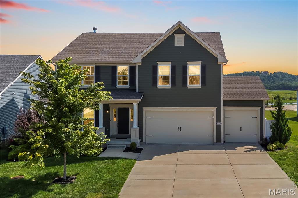 Why wait to build when you can have it all now? This stunning 2020 Consort-built 2-story in the highly sought-after Windswept Farms subdivision is loaded with upgrades, beautifully maintained, and perfectly positioned overlooking the subdivision's common ground and lake.

Offering 4 bedrooms, 2.5 bathrooms, and a 3-car garage, this home welcomes you with a private front office - ideal for remote work, homework, or a quiet retreat. The heart of the home is the open-concept living area featuring expansive picture windows, recessed lighting, and smart-home features throughout, including smart blinds, thermostat controls, and a built-in sound system. Natural light pours into the space while showcasing the serene views off the back of the home.

The chef's kitchen is sure to impress with custom 42" cabinetry, granite countertops, a massive center island, stainless steel appliances, chevron tile backsplash, dedicated coffee bar area, and a spacious walk-in pantry. The cozy living room features a wood-burning fireplace, while an adjacent flex space with custom built-in bookshelves offers the perfect personal library, reading room, or formal dining area. Step outside onto the composite deck and enjoy morning coffee or evening sunsets overlooking the lake and common ground - a peaceful backdrop rarely found in newer construction. An irrigation system helps keep the lawn looking its best all season long.

The main-floor laundry room includes built-in storage and a hidden bonus storage area for added convenience.

Upstairs, you'll find a versatile loft perfect for movie nights, gaming, or additional living space, along with four generously sized bedrooms. The spacious primary suite is a true retreat, featuring a large walk-in closet with custom organizer and a luxurious en-suite bath complete with a soaking tub and separate shower. Thoughtfully designed custom closet systems are featured in all walk-in closets throughout the home.

Car enthusiasts, hobbyists, and truck owners will appreciate the extended 9-foot-deep garage bay, providing valuable extra space for larger vehicles, storage, or workshop needs.

Located within the award-winning Rockwood School District and just minutes from Highway 44, Highway 109, and the shops, restaurants, and charm of downtown Eureka, this home offers the perfect blend of convenience, community, and modern living.

This is the one you've been waiting for - where thoughtful upgrades, exceptional views, and an unbeatable location come together to create something truly special.