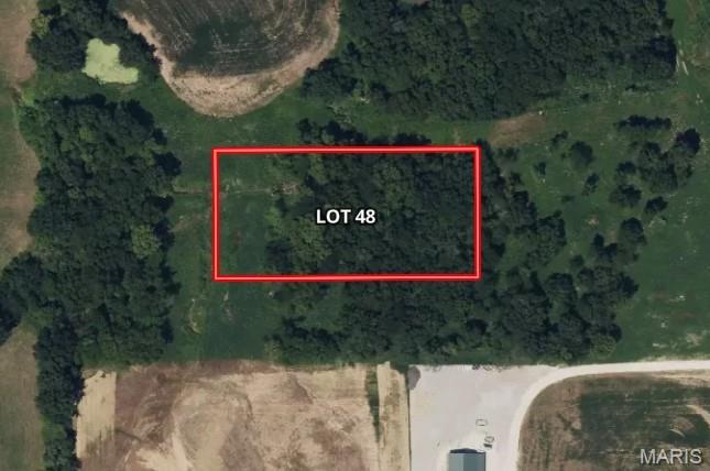 Beautiful and spacious 1+ acre lots available in the desirable McMorland Acres community, located in St. Paul, MO. These prime parcels are perfect for custom-built homes and offer the flexibility to bring your own builder to create your dream home. Enjoy the convenience of public utilities, including water and sewer services, making for an easy and efficient building process. The lots are located in a peaceful, yet easily accessible area, just moments from Hwy 70, providing quick access to surrounding areas, shopping, dining, and more. Whether you’re looking for a quiet retreat or a place to build a family home, McMorland Acres offers a fantastic setting to suit your needs. Additional Rooms: In Platted Subdv.