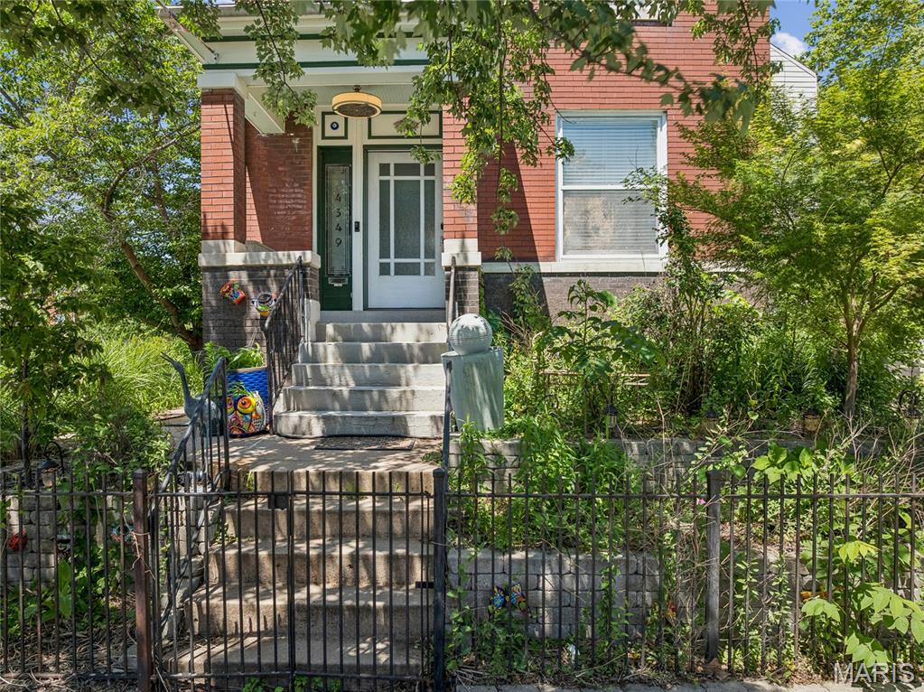 Tenant is finally moving out and 4349 Gibson is ready to find its new owner!  This is the one that deserves the right swipe....  Welcome to a home that has it all, and a location that does too. This inviting 3 bedroom, 3 bath residence is a rare find in one of St. Louis' most vibrant and walkable neighborhoods, offering the perfect combination of historic charm, thoughtful modern updates, and an unbeatable address right in the heart of Forest Park Southeast. Step inside and be immediately impressed by soaring tall ceilings, gorgeous crown molding and millwork, and a bright, open layout that feels both welcoming and effortlessly stylish. Freshly painted throughout, with newer flooring and a cozy electric fireplace, every detail has been considered. The stunning tray ceiling in the dining room is a true conversation piece, adding a touch of elegance that sets this home apart. The open concept kitchen is made for entertaining, featuring a gas range, stainless steel appliances, a tiled backsplash, and a custom center island with breakfast bar that will be the heart of every gathering.  Step outside onto your private deck and balcony and breathe it all in. The Bug Store Gazebo showcases seven different rose varietals, surrounded by lush landscaping and a serene neighboring Community Garden that offers a peaceful, green backdrop unlike anything else you will find in the city. An oversized parking pad completes the outdoor package.  Just steps away, The Grove's Manchester Avenue is lined with restaurants, bars, dance floors, coffee shops, and galleries, including neighborhood favorites like Urban Chestnut Brewery, The Gramophone, Everest Cafe, Atomic Cowboy, and HandleBar. Walk to Chouteau Park and the Dog Park for your morning routine, then spend your evenings exploring world class dining, craft beer, nightly live music, and annual events like Grovefest and the Flyover Comedy Festival, all steps from your front door. Forest Park, with the St. Louis Zoo, Science Center, The Muny, and two museums, is right next door, and the Central West End, Washington University Medical Center, and Cortex are all just minutes away. Easy access to major highways makes the entire city yours. Living St. Louis + 3

This is the lifestyle today's buyers are searching for and it rarely comes available at this price point. Showings are limited, so do not wait. Schedule your private appointment today before this one is gone.