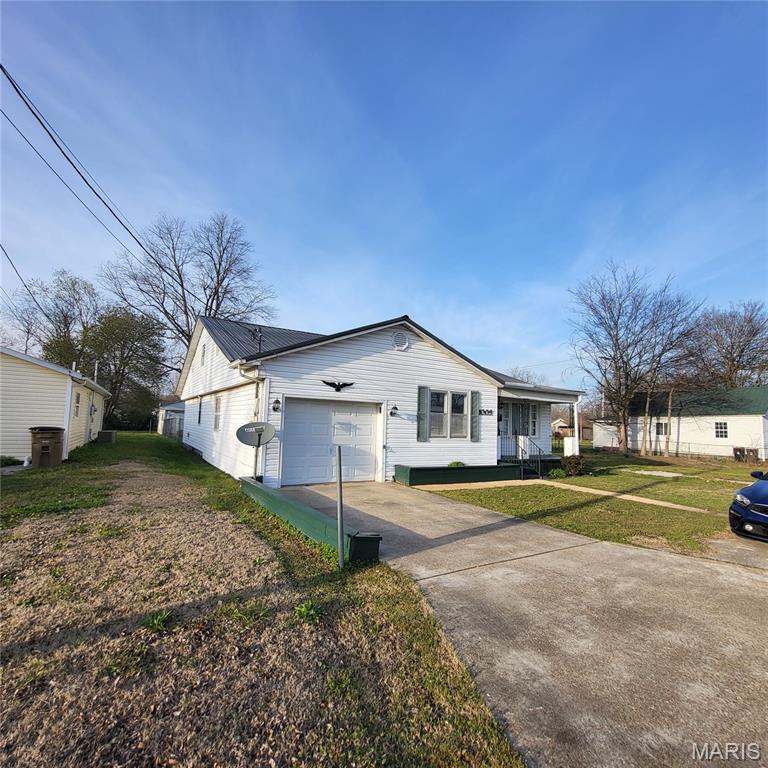 Updated 3-bed, 2-bath home, additional living room, covered porch, attached garage, and fenced back yard. Priced for a quick sale!