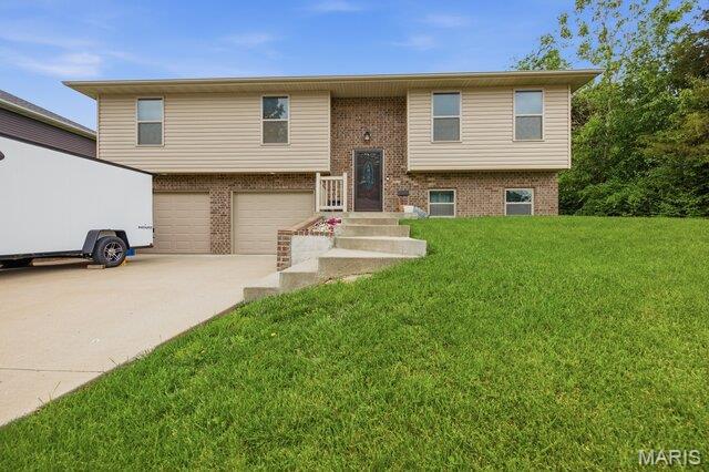 Step into this meticulously maintained home! Just 10 minutes from Jefferson City this 3 bedroom, 3 full bath home features a dynamic split-level floor plan that maximizes both privacy and open-concept flow. This 2018 build stand out with its’s luxury ceilings, a bright main living area atmosphere, and fenced in backyard built for entertaining. Every corner of this home radiated a brand new feel that you won’t want to miss!