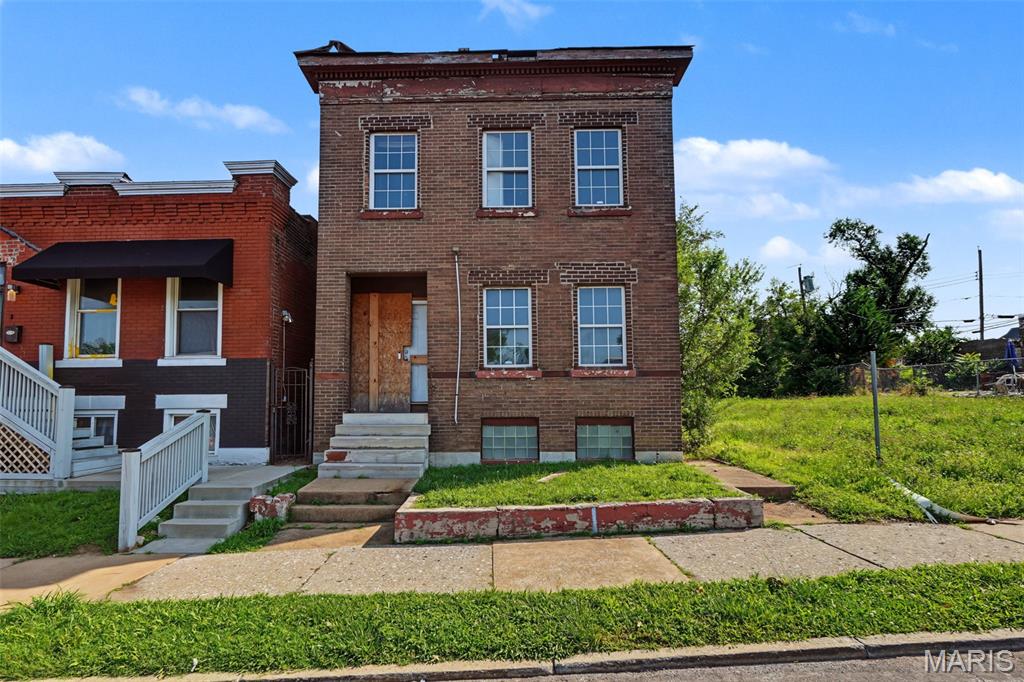 Opportunity awaits at 4611 Natural Bridge Avenue. This substantial, all-brick two-story property offers nearly 2,000 square feet of living space and is ready for a complete transformation. Originally configured as a duplex, the flexible floor plan also lends itself beautifully to conversion into a spacious 3-5 bedroom, 3-full bath single-family residence, giving investors and renovators multiple exit strategies.

Much of the interior has already been opened to the framing, allowing contractors to immediately assess the structure and begin reconstruction. The home retains many of the architectural features that make historic St. Louis properties so desirable, including soaring ceilings, pocket doors, oversized window openings, original millwork, original exterior tile floors at entryway, multiple fireplaces, exposed brick, and generous room sizes that are difficult to replicate in new construction.

The property requires a comprehensive renovation, including replacement of the roof, making it best suited for experienced investors, contractors, or buyers seeking a true value-add project. The existing layout, updated windows, and exposed structural components provide a clear canvas for redesign while preserving the character of this classic brick building.

Located in Penrose, an area seeing continued reinvestment and renovation activity, this property presents an opportunity to create substantial equity through thoughtful restoration. Whether your vision is a modern owner-occupied residence, a renovated duplex, a long-term rental, or a resale project, the possibilities are significant.



Interior has been substantially gutted.
Ceiling joists are exposed.
Mechanical runs are visible.
Basement structure is accessible.
Foundation walls can be inspected.
Newer electrical panel is present.
HVAC equipment appears to have been updated at some point.
Interior debris has largely been removed.
Large original window openings remain.
Opportunity to redesign floor plan prior to reconstruction.

Bring your contractor, your designer, and your imagination—opportunities offering this size, flexibility, and potential at this price point are becoming increasingly difficult to find. Whether you're planning a premium single-family resale, long-term rental, or historic restoration, much of the exploratory demolition has already been completed.