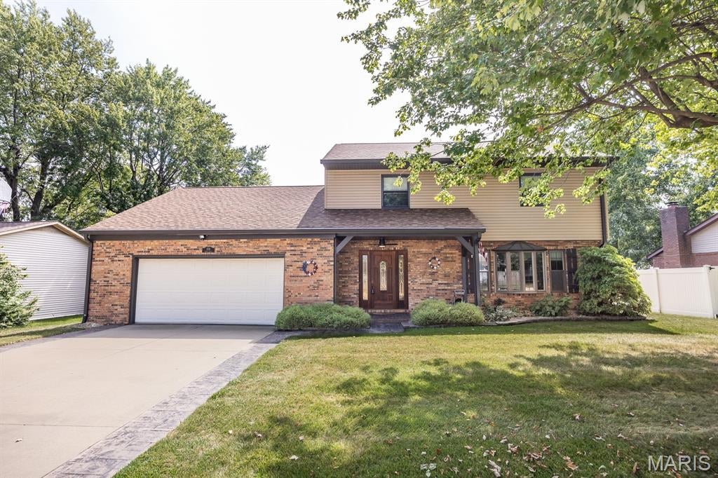 Pride of ownership shows throughout this meticulously cared for home!  Step onto the brick paved front porch with ceiling fan to enter the front of the home.  The main floor features two living spaces, an open kitchen/living space and a dining room as well as a half bath.  The kitchen boasts loads of cabinets, solid surface countertops, under cabinet lighting and all appliances stay!  Also on the main floor is a half bath and laundry space, Electrolux washer and dryer are included.  Off the back is a gorgeous four seasons room with wet bar..  The back yard is partially fenced with white vinyl privacy fencing.  Upstairs you will find four bedrooms and a great bonus room making it perfect for a large family.   Two full baths complete the upstairs.  This home features many updates including roof/siding/gutter guards (2021) fully encapsulated crawls space including sump pump and humidifier, Hot Water Heater (2018) Heat Pump/AC (2016).  With an oversized garage, patio and is nicely landscaped backyard this is a perfect place to call HOME.  Convenient to Elementary and Junior High, wonderful library, shopping, Rec Plex and I64...don't pass this one up, call today to make it your own!  Buyers to verify all information.