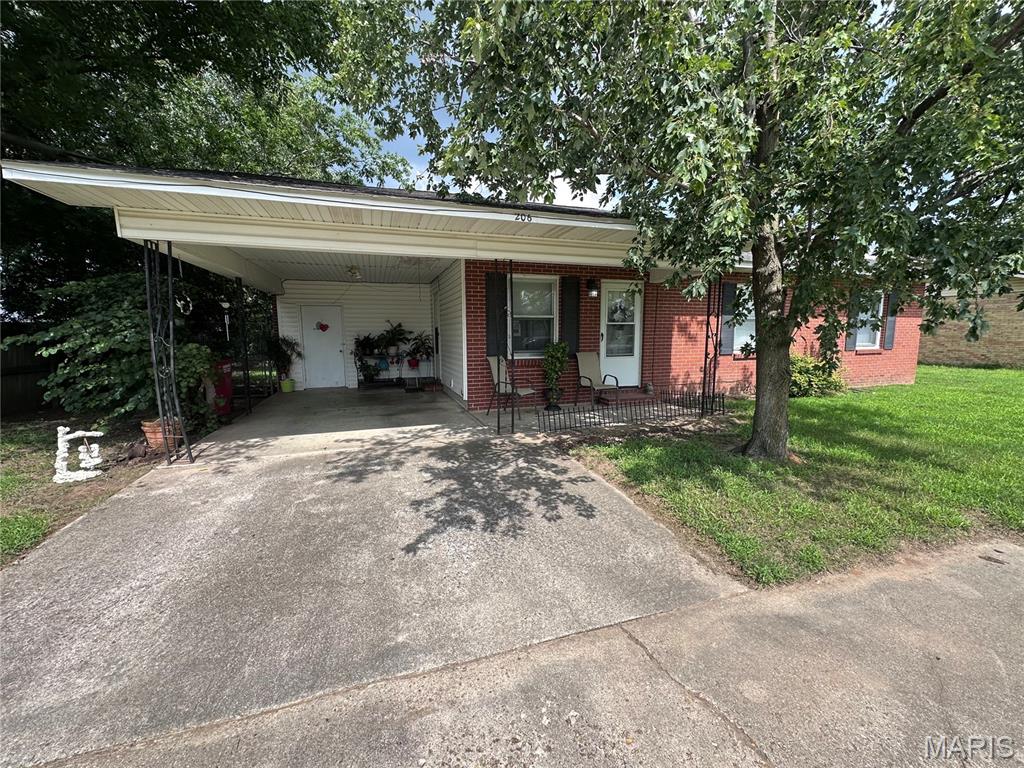 Full brick home that has been loved, but ready for new owners. Well maintained with a good layout. Fully fenced backyard for kids and pets and a carport with a storage room. Cute front porch and a back patio for grilling and a picnic table.