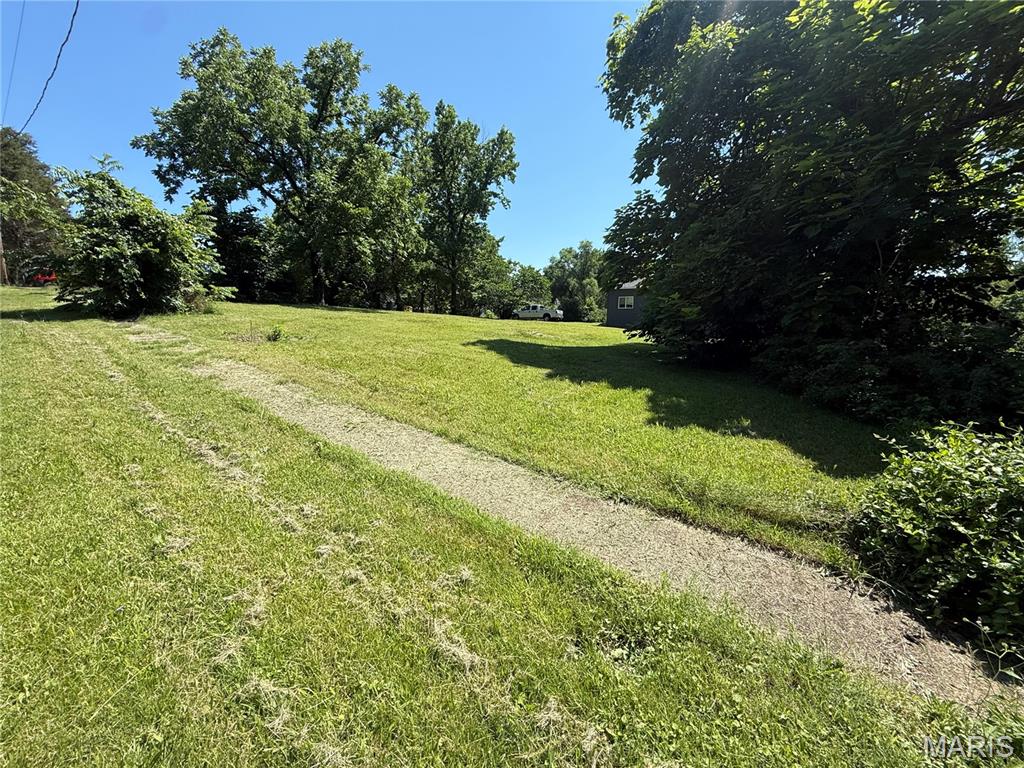 Great corner lot located within the city limits of Park Hills. This property previously had a trailer on site and has been mostly cleared, leaving only a few mature trees. An excellent opportunity to build your new home with utilities potentially available from prior use (buyer to verify). Conveniently located near Central Elementary School. Don't miss this ready-to-build lot in an established area!