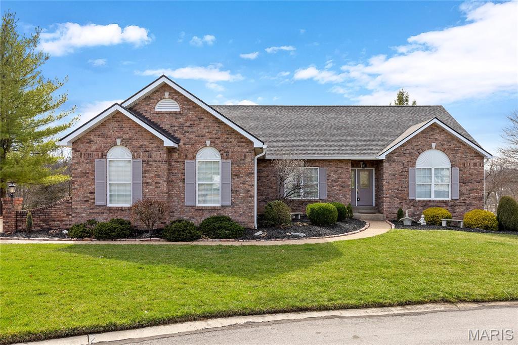 This beautifully designed ranch home features an open floor plan with soaring ceilings & extensive millwork. Vaulted entry foyer leads to formal dining room with wide cased entryways & stunning great room with cathedral ceiling & dramatic wall of windows that overlook the 10th & 16th holes on the South course. Chef's kitchen with oak cabinetry and stainless steel appliances adjoins light-filled breakfast room with wide bay window & atrium door to deck. Spacious primary bedroom suite with sitting room & luxury bath offers a relaxing retreat. 2nd & 3rd bedrooms with Jack & Jill bath completes the main floor living quarters. Walk-out Lower Level includes recreation room with brick fireplace, game room with wet bar & full bath. Situated on a private cul-de-sac lot with deck & covered patio. Golf community lifestyle with included lawn maintenance & snow removal. Clubhouse, pool, tennis courts & fitness center are just a short walk or cart ride away.