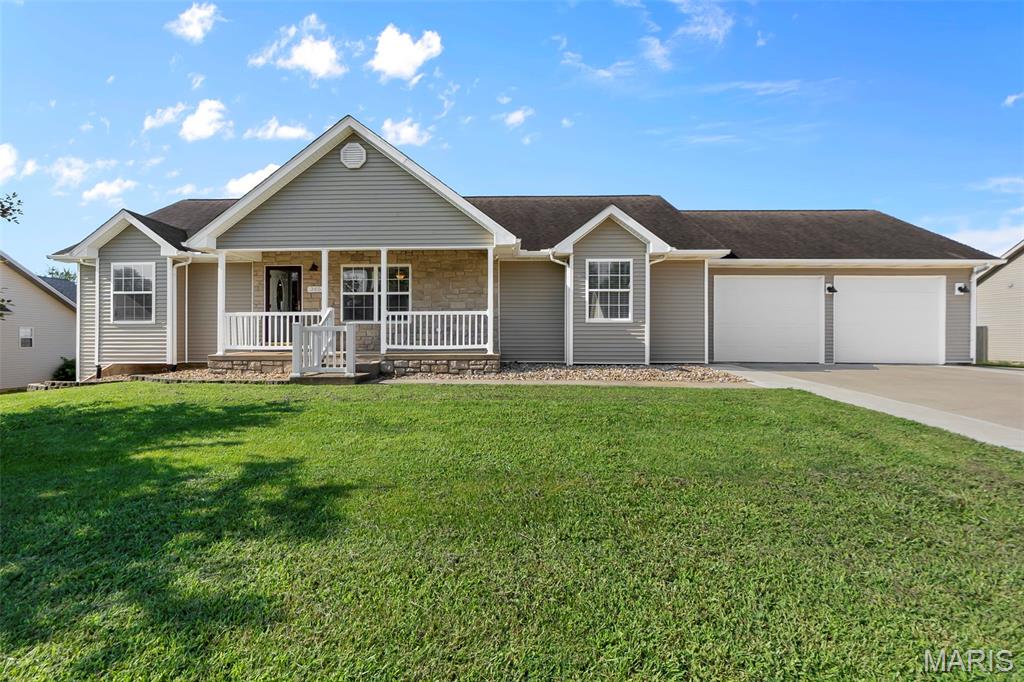 Welcome to this turn-key ranch home located in a great neighborhood just minutes from Jackson schools! Designed with comfort and functionality in mind, this home offers a spacious layout that's perfect for everyday living and entertaining.  As you step inside, you'll appreciate the open flow from the large living room into the dining area and kitchen, creating an inviting space for family gatherings and entertaining. The kitchen features newer appliances (2023) and plenty of room for meal preparation and everyday living.

Step outside onto the covered wood deck, complete with newly added stairs leading to the flat backyard, the perfect space for relaxing, entertaining, or enjoying the outdoors.

The split-bedroom floor plan provides added privacy, with a spacious primary suite featuring a large bedroom and private bathroom.

The finished walk-out basement expands your living space with a generous family room, an additional bedroom and full bathroom, plus abundant storage.

Recent improvements include new handrails, additional washer and dryer hookups in the basement, an extended concrete patio, deck stairs, and an expanded electrical panel, adding both convenience and value.

This move-in-ready home combines a desirable location, thoughtful updates, and plenty of space to grow. Schedule your private showing today!