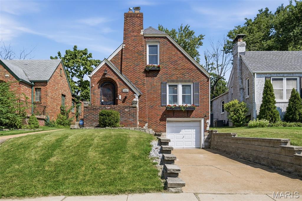 Charming meets modern in this beautifully updated 1930 gem located on a cul-de-sac street! Historic character shines through with numerous archways, the original front door, and a distinctive staircase, while extensive updates provide the comfort and functionality today's buyers desire. The stunning kitchen and dining room renovation features crisp white 42-inch cabinetry, granite countertops, stainless steel appliances, and custom built-in banquette seating with coordinating cabinetry. The spacious living room, updated baths, finished lower-level recreation room, and zoned HVAC system new in 2022 add modern convenience throughout. The main level offers a generously sized bedroom and updated full bath, while upstairs you'll find two additional bedrooms and a second full bath. Enjoy outdoor living on the large level lot with a paver patio and oversized one-car garage. A walking path at the end of the street provides easy access to community parks, schools, and neighborhood activities, while the home's highly walkable location makes it easy to enjoy nearby shopping, dining, parks, and everyday conveniences. Newer windows complete this move-in-ready home. Brentwood living at its best!