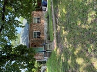 Calling ALL INVESTORS or FIRST TIME Homebuyers Take a look at this charming all-brick bungalow in a quiet neighborhood of Crestwood! This 2-bedroom, 1-bath home features a solid brick exterior, off-street parking, and a level, fenced backyard. Conveniently located across from a neighborhood park with planned future expansion. Location, LOCATION, Location!  Located in the center of it all.  Shopping, dining and all the activities and entertainment the St. Louis area has to offer.  It is  being sold "as is" and needs some TLC making it an open canvas offering a great opportunity to add your personal touch or investment value. Great potential in a desirable location in the sought after Lindbergh School District.  Come take a look and make it your own!