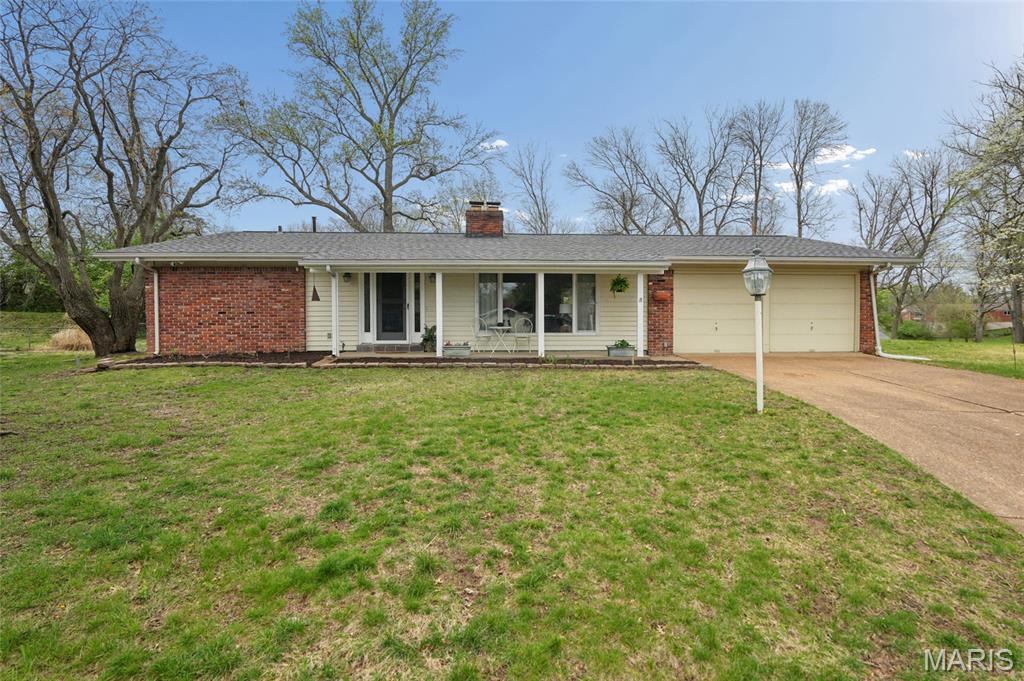 WELCOME to this lovely Mid Century Modern Home. That truly has it all. Spectacular design with 4 bedrooms 3 bath. The Heart of the home reveals  a Chef’s kitchen and feature 42” cabinets, Sleek countertops, Distinctive backsplash, Profesional gas range with integrated air fryer, Stainless Steel Appliances, Double fireplace with full finished  Venetian Plaster. Laundry Room on the main level, Updated bathrooms, very elegant LVP Water resistant  Flooring throughout . Enjoy the Solarium/Sunroom Free of bugs. New Architectural Roofing. The basement offers abundant storage solutions, and plenty of space for entertainment. Great Subdivision with Amenities like Pool, Playground, Club House and Community Events. Want to be in one of the best central locations in Saint Louis? This is your Chance.