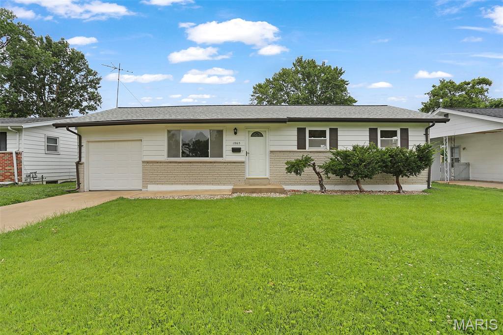 Beautifully maintained and thoughtfully updated, this 3-bedroom, 1.5-bath home in Florissant offers the perfect combination of comfort, style, and functionality. Featuring an attached garage, full basement, and covered patio, this move-in-ready home provides exceptional value and everyday convenience.
The bright and inviting living room is filled with natural light from oversized front windows and features durable luxury vinyl plank flooring that flows throughout the main living areas. The recently updated eat-in kitchen showcases refaced cabinetry, a new countertop, and updated flooring, creating a fresh and welcoming space for meals and gatherings.
All three bedrooms are conveniently located on the main level, including a primary bedroom with a private half bath. The full bathroom has been beautifully remodeled by Bath Fitter and includes updated flooring, a new vanity and sink, and a custom walk-in shower with glass doors and upgraded hardware.
The full, unfinished basement offers abundant storage space and endless possibilities for future finishing, a workshop, hobby area, or recreation room. Washer and dryer hookups and utility access are also located in the lower level.
Outside, the covered rear patio provides the perfect setting for entertaining guests, enjoying family barbecues, or relaxing with your morning coffee. A concrete driveway leads to the attached garage, while the home's convenient location places you just minutes from schools, parks, shopping, dining, and major commuter routes.
With numerous recent updates, low-maintenance living, and plenty of room to grow, this Florissant home is ready for its next owner to move in and enjoy.