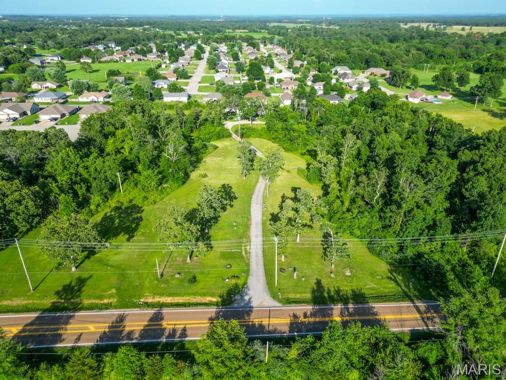 600' FRONTAGE 9.65 ACRES WITH 17 MOBILE HOME HOOKUPS CITY WATER, SEWER AND ELECTRIC. OR BEAUTIFUL BUILDING SITE. Location: City, High Traffic was a mobile home park at one time.could possibly be reasoned  per  P and Z