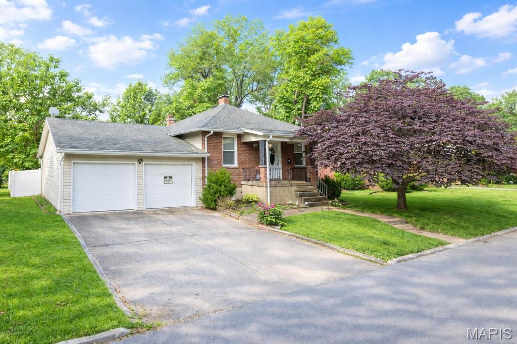 TONS OF POTENTIAL HERE!! CHARMING BRICK WITH OVERSIZED 2 CAR ATTACHED GARAGE. HUGE LIVING ROOM COULD OFFER DIFFERENT OPTIONS. ONE BEDROOM AND 2 BATH AT PRESENT. POSSIBLE 2ND BEDROOM IN LOWER LEVEL. 2ND BATH IN LOWER LEVEL. FULL KITCHEN IN LOWER LEVEL HAS ISLAND/PENINSULA. KITCHEN OPENS TO FAMILY ROOM WITH BRICK GAS FIREPLACE. STORAGE/LAUNDRY AREA COULD BE REVAMPED INTO SECOND BEDROOM W/BATH. NEWER HVAC, THERMAL WINDOWS, ARCH. SHINGLE ROOF W/NEWER GUTTERING AND GUTTER GUARDS. NEWER FRONT DOOR & STORM DOOR. CIRCUIT BREAKER PANEL IN GARAGE. HWH ONLY 6 MONTHS OLD. BEAUTIFUL WHITE VINYL FENCE ENCOMPASSES THE LARGE LEVEL BACK YARD. MANY SHADE TREES. COMFORTABLE PATIO.  MASSIVE 23 X 36 DEEP GARAGE  FEATURES HUGE STORAGE AREAS. ESTATE SALE. SOLD AS-IS, INCLUDING CITY OCCUPANCY. TOTALLY LIVEABLE ONCE FRESH PAINT AND FLOORING ARE IN PLACE. CAMERAS AND DOOR BELL DO NOT STAY. CENTRALLY LOCATED NEAR SHOPPING, RESTAURANTS AND PUBLIC TRANSPORTATION.