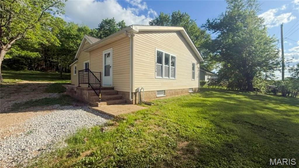 Enter this beautifully updated 3-bedroom, 1-bath home featuring stylish new flooring and fresh paint throughout. The fully refreshed interior includes all new fixtures, updated kitchen cabinets, modern countertops, and new appliances, creating a clean and contemporary feel from room to room. 3rd bedroom has hook ups for laundry, could be used as bedroom or laundry room or both. Every detail has been thoughtfully upgraded, making this home truly move-in ready. This charming home offers comfort, convenience, and modern updates. This property is eligible for HomePath financing.