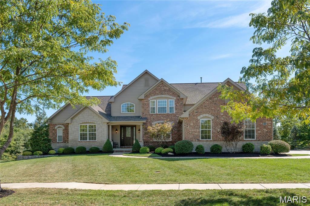 Stately 1.5 story custom build in gated enclave of Estates at Wildhorse Canyon offers 5 beds, 4.5 baths and over 5,500 square feet of finished living. Grand foyer is flanked by study and formal dining and leads into the two story great room with gas fireplace and window wall overlooking the pristine, level 1.2 acre lot. Gourmet kitchen with oversized island, custom cabinetry, granite counters, walk in pantry and SS appls opens to the breakfast area and inviting hearth room with stone fireplace. Spacious main floor primary suite with luxury ensuite bath and walk in closet. Upstairs you will find three oversized bedrooms with walk in closets, two full baths and a loft space. Lower level is perfect for entertaining that was redone– expansive family room, professional home gym, guest bedroom and full bath. Walk out to the stunning backyard with newly added pool with designer patio with built in firepit area. This property has it all and is tucked away in a boutique, upscale neighborhood in an incredible location!