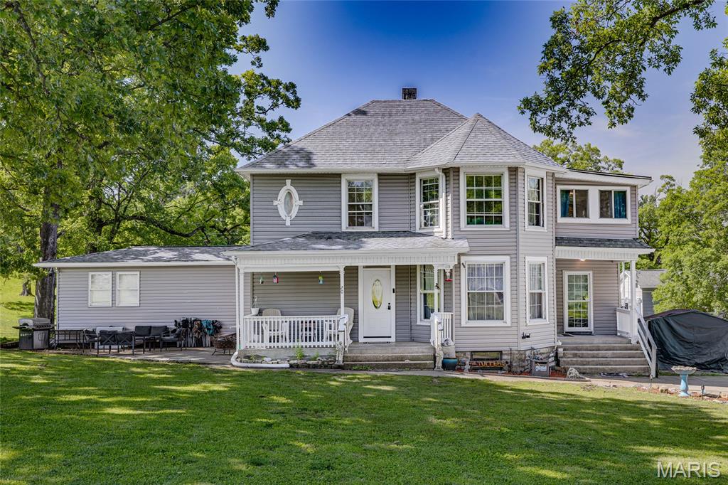 ?? Price Improvement – Motivated Sellers! Step back in time with this beautifully preserved 1910 historic home, nestled in a private, close-knit neighborhood rich with charm and character. Situated on a spacious one-acre lot surrounded by mature trees, this property offers both privacy and timeless appeal.

Inside, you’ll find original hardwood floors, crown molding, and a working pocket door that showcases the home’s craftsmanship. The main-floor primary bedroom features a handicap-accessible shower in the master bath for added convenience. Additional highlights include an office or hobby room, main-floor laundry, and a sunroom on the second floor that provides a bright, relaxing retreat.

Modern updates blend seamlessly with historic details—two new HVAC systems (installed 12 months ago), roof and windows less than 10 years old, and new deck, front, and side doors replaced just 2 years ago. The walk-out basement offers ample storage and includes a sump pump.

Appliances include a range and dishwasher only one year old. Owners note that the original hardwood floors are in need of some love, offering an opportunity to restore their timeless beauty.

This rare gem combines historic charm with modern comfort—perfect for those who appreciate character, space, and community. Step back in time with this beautifully preserved 1910 historic home, nestled in a private, close-knit neighborhood rich with charm and character. Situated on a spacious one-acre lot surrounded by mature trees, this property offers both privacy and timeless appeal.

Inside, you’ll find original hardwood floors, crown molding, and a working pocket door that showcases the home’s craftsmanship. The main-floor primary bedroom features a handicap-accessible shower in the master bath for added convenience. Additional highlights include an office or hobby room, main-floor laundry, and a sunroom on the second floor that provides a bright, relaxing retreat.

Modern updates blend seamlessly with historic details—two new HVAC systems (installed 12 months ago), roof and windows less than 10 years old, and new deck, front, and side doors replaced just 2 years ago. The walk-out basement offers ample storage and includes a sump pump.

Appliances include a range and dishwasher only one year old. Owners note that the original hardwood floors are in need of some love, offering an opportunity to restore their timeless beauty.

This rare gem combines historic charm with modern comfort—perfect for those who appreciate character, space, and community.