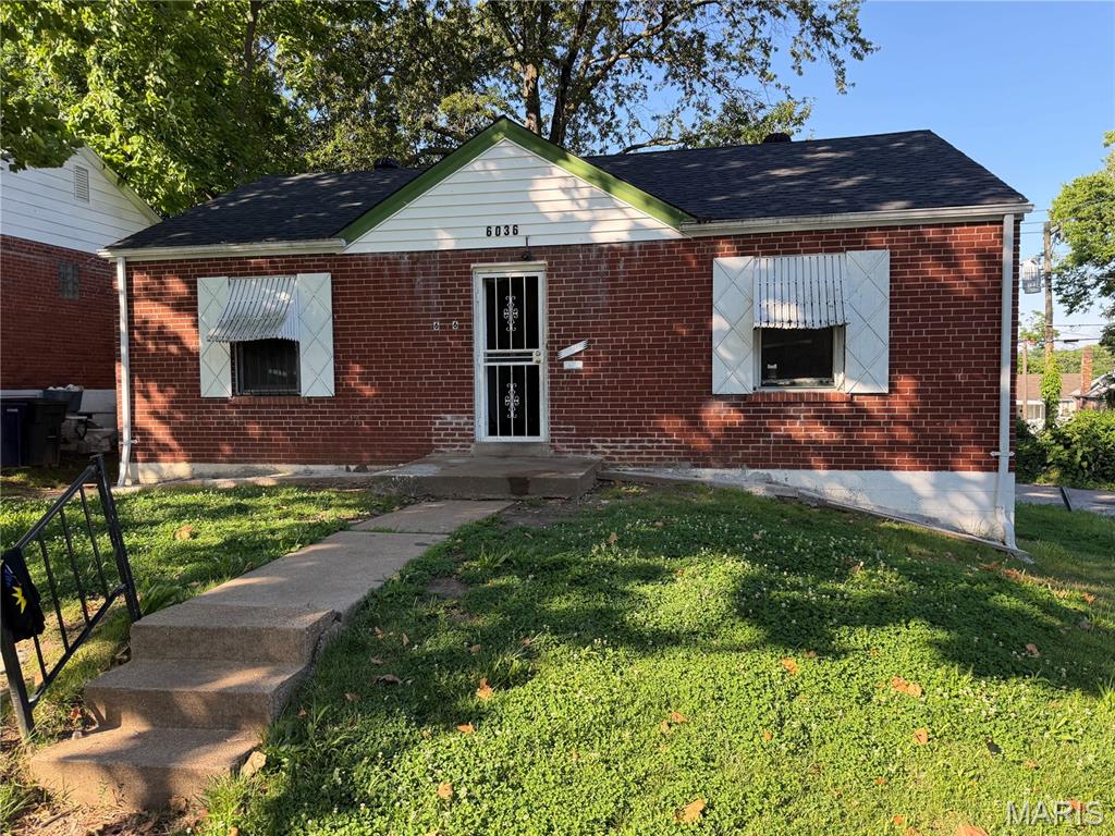 Charming all-brick ranch offering strong investment potential and classic character. Previously rented for $1,200 per month, this 2-bedroom, 1-bath home features hardwood flooring throughout the living room and bedrooms, along with a decorative fireplace flanked by built-in bookcases that adds warmth and charm to the main living space. The spacious eat-in kitchen provides ample room for dining and everyday living. A full basement offers abundant storage and includes updated PVC plumbing, newer water lines, and an upgraded electrical panel. Additional improvements include a newer roof and a fenced backyard, perfect for pets, outdoor entertaining, or added privacy. Whether you're looking to expand your rental portfolio or purchase a home with solid fundamentals and value-add potential, this property presents an excellent opportunity. Property is being sold As-Is.