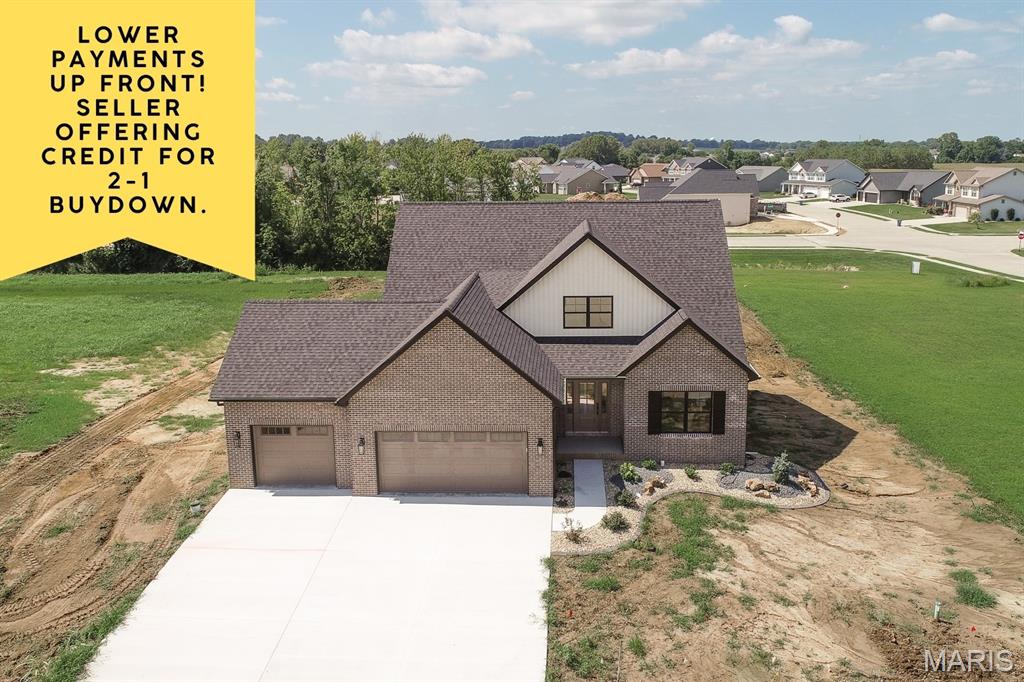 SELLER INCENTIVE! Seller is offering a credit toward a 2-1 interest rate buydown with an acceptable offer, allowing buyers the opportunity for a reduced interest rate during the first two years of their loan. Brand new construction in the Summit of Shiloh! Welcome home to this spacious 1 1/2 story home offering 5 bedrooms and 5 bathrooms with the primary suite on the main level. The kitchen is the heart of the home, featuring a large center island, stainless steel appliances and a hidden walk-in pantry. The open living area is anchored by a cozy gas fireplace, while the flex room provides the perfect space for a home office, formal dining room or additional living space. Durable LVP flooring flows throughout the main level and most of the upstairs. The primary suite features a beautifully appointed bath with dual vanities and a gorgeous tiled shower. Upstairs offers additional living space with a spacious loft plus a cozy reading nook, perfect for teens, kids or a second hangout space. The partially finished basement expands the home even further with a finished family room, bedroom and bathroom. Still, plenty of room for storage or to add extra square footage in the future. Enjoy the outdoor living on the covered back patio overlooking a generously sized lot. Community pool and convenient location to Scott AFB. MUST SEE! Ask for more details about the 2-1 buydown. Agent interest.