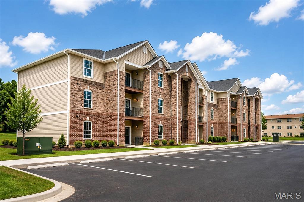 Brand-New Living in Ellisville: Discover Carmel Woods, where new construction meets an established Ellisville location in the sought-after Rockwood School District. These stylish 2-bedroom, 2-bath condos feature open-concept living, modern finishes, abundant natural light, and private outdoor spaces.

Enjoy everyday convenience with in-unit laundry, covered parking, a low HOA fee, and dedicated parking. Located just off Manchester Road, you're close to shopping, dining, recreation, Bluebird Park, and everything West County has to offer. Please note: Model unit #131 is available to tour and provides an opportunity to see the design, finishes, and overall layout. While you are showing the unit #137. Some exterior photos are shown as renderings to give you an idea of what the completed property is expected to look like.

Schedule your private tour today and discover the fresh, modern lifestyle at Carmel Woods!