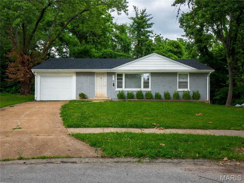 Welcome home to this move-in ready 3-bedroom brick ranch, perfectly tucked away at the end of a quiet cul-de-sac! Combining timeless brick durability with modern updates, this affordable gem is a rare find.Step inside to find gorgeous, gleaming hardwood floors that flow seamlessly through a bright and inviting living space. The beautifully updated kitchen boasts stylish finishes andstainless steel appliances. All three bedrooms offer comfortable accommodations with easy access to the central bath. The fully fenced backyard is perfect for pets, playtime, or summer barbecues. A detached 1-car garage provides excellent storage and secure parking. Located in a peaceful neighborhood with no through traffic, this pristine home offers the perfect blend of comfort, privacy, and incredible value. Schedule your private tour today before it’s gone!