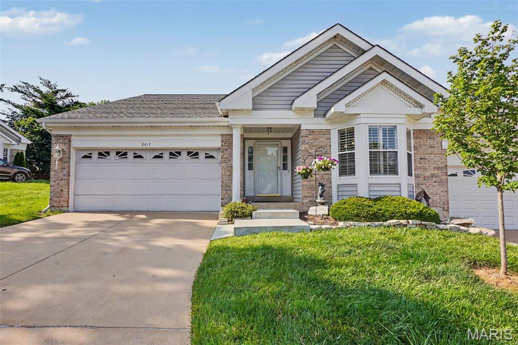 Welcome home to easy, low-maintenance villa living in the heart of Lake St. Louis! This beautifully updated 3-bedroom, 3 full-bath villa offers the perfect blend of comfort, convenience, and entertaining space.

The main level features a spacious primary suite with a large private bath, an additional generously sized bedroom, additional full bath and convenient main-floor laundry. Beautiful engineered hardwood flooring flows through the living and dining areas, where a cozy gas fireplace creates a warm and inviting atmosphere. The updated kitchen boasts quartz countertops, tile flooring, and a movable island that provides flexible workspace and storage. Step through the sliding glass doors to the deck and enjoy your morning coffee while overlooking the peaceful surroundings.

Fresh paint throughout gives the entire home a bright, updated feel. The finished lower level expands your living space with a third bedroom, third full bath, updated flooring, and a wet bar that's perfect for hosting family and friends. Recently updated HVAC system provides added peace of mind.

As a Lake St. Louis resident, you'll enjoy coveted lake rights and access to outstanding community amenities, including lake-rights, pool, pickleball courts, golf, clubhouse activities, and more.

Don't miss your opportunity to own a beautifully maintained villa and enjoy all that the Lake St. Louis lifestyle has to offer!