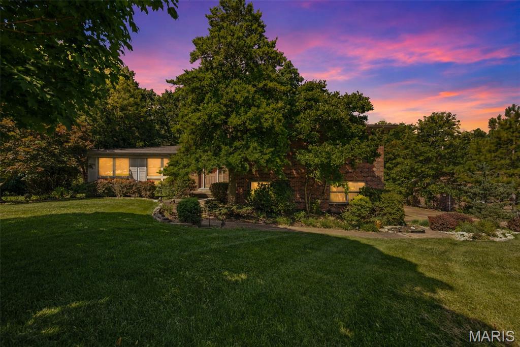 Ready to show 7/8/26. Nestled on a picturesque half-acre lot in the heart of Sunset Hills, this timeless mid-century home offers the perfect blend of privacy, character, and opportunity. Backing to common ground with a park-like setting, you'll enjoy peaceful views and exceptional privacy year-round. A welcoming entry foyer opens to a spacious living room highlighted by a beautiful windows that fill the home with natural light. The kitchen and breakfast area overlook the deck and backyard, creating the perfect setting for everyday living and entertaining. Just off the main living area, a private office with breathtaking backyard views offers an inspiring work-from-home space or quiet retreat. Upstairs, you'll find four generously sized bedrooms, two full bathrooms, walk-in closets, and an abundance of storage throughout. This home offers the perfect opportunity to add your own personal style and updates.
The walk-out lower level features a spacious recreation room with a fireplace, an additional half bath, laundry, and plenty of room for entertaining, a home gym, or a play area. The basement includes extensive built-in shelving, providing exceptional storage and organization and work shop room. 
Located in one of Sunset Hills most sought-after neighborhoods, and within the award-winning Lindbergh School District, this home offers an outstanding floor plan, incredible privacy, mature trees, and endless possibilities to create your dream home.
The house sits on a half an acre lot. The lot to the left of it (looking from the street) is not for sale at this time.
