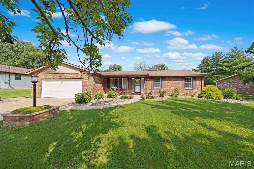 Beautifully maintained all brick ranch located at the end of a quiet cul-de-sac in unincorporated Fosterburg Township .Situated on a spacious 1/2 acre lot, this move-in ready 3-bedroom, 2 bath home offers peaceful country living with convenient access to shopping, dining, and highway 255 The generous backyard provides plenty of room to relax, entertain, garden or simply enjoy the outdoors, Inside you will find new flooring throughout a large eat-in kitchen with an island, all new SS appliances, main floor laundry, and a  family room with a cozy gas fireplace. You will love the space in the primary suite, complete with an en-suite full bath.  Two additional bedrooms and a second full bath provide plenty of space for family or guests. A 2-car attached garage, 4-foot crawl space, and backyard shed offer ample storage. Recent updates include water heater 2025 garage door 2024, roof 2019, Norweco septic system 2023, sump pump 2021, and furnace blower 2021.  Just move right in and enjoy the peace of mind that comes with a well- maintained home and numerous updates already completed. With everything located on one level, this home offers easy comfortable everyday living.