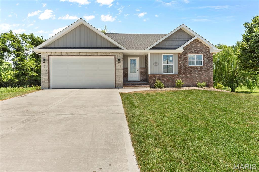 New Construction home in Prairie Trail Estates. Situated in the rear of this newer community on a culdesac lot. This 5 bedroom, 3 bath home is adorned with a neutral color palette making it a perfect canvas for your personal decor.  Low maintenance luxury vinyl plank flooring, great room featuring a fireplace, eat-in kitchen with center island and nice sized pantry. You'll love relaxing out on the composite finished covered deck overlooking the private backyard. Primary ensuite featuring a full bath and walk-in closet. 2 additional bedrooms and full bath complete the main floor. Lower level is finished and provides an additional family room and 2 BEDROOMS as well as a full bath and plenty of storage. This basement projects lots of natural light thru the lookout windows. Home is under construction and additional photos to come as construction progresses, but don't wait! Call today for your personal tour.