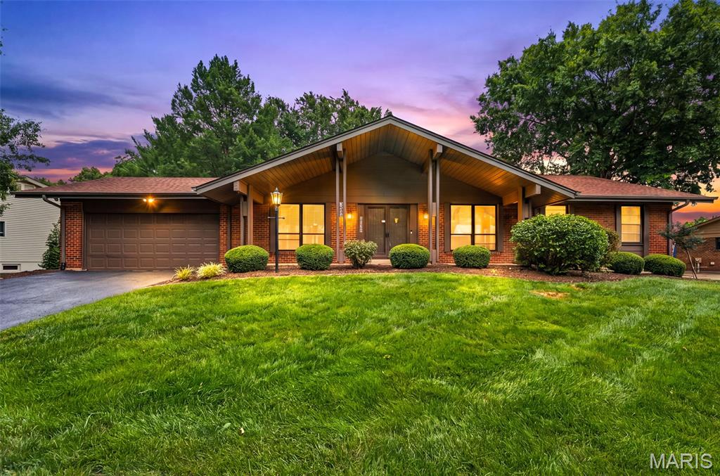 Stunning 4-Bedroom Brick Home with Finished Lower Level in Parkway School District. Welcome to this beautifully maintained 2,500-square-foot brick home located in the highly desirable Parkway School District. Offering 4 spacious bedrooms, 2 full baths, and 2 half baths, this move-in-ready residence combines timeless character with modern conveniences in an exceptional family-friendly setting. From the moment you arrive, you'll appreciate the classic curb appeal and quality craftsmanship of this all-brick home. Inside, fresh paint and new flooring throughout create a bright, updated atmosphere that complements the home's generous living spaces.  The inviting family room serves as the heart of the home, featuring a cozy wood-burning fireplace and built-in bookshelves—perfect for relaxing evenings or entertaining guests. The spacious kitchen is equipped with stainless steel appliances and offers ample workspace and storage with a nice sized pantry, main floor laundry.  The adjoining dining area showcases a charming built-in buffet, adding both style and functionality.  Huge master suite complete with bathroom with soaking tub and separate shower.  Three additional bedrooms with a full and half bath.  The partially finished lower level offers even more living and entertaining space, complete with a wet bar, recreation area, half bath and plenty of storage.  Step outside to enjoy the level, fully fenced backyard—perfect for children, pets, outdoor gatherings, and summer barbecues. Additional features include hardwired security cameras for added peace of mind and security.  Conveniently located near shopping, dining, parks, and major highways, this exceptional home offers the perfect combination of space, updates, and location. New Furnace being installed 6/25/2026! Comes with Extended Warranty With Classic Aire Care!  Don't miss your opportunity to own this beautifully updated Parkway School District home—schedule your private showing today!