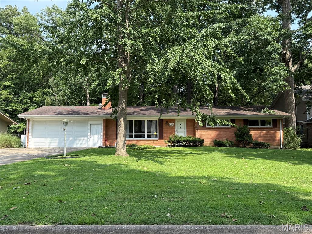 Brookwood Drive - walking distance to Dennis Scivally Park and Alma Schrader School.  Large brick ranch, full basement, 2 car garage. Fabulous opportunity for a little sweat equity.