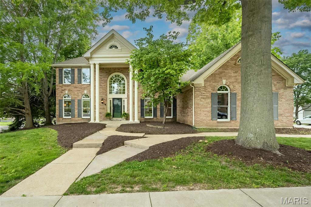 12700 Corum Way Drive ~ Simply SPECTACULAR! This stately beauty will steal your heart with all of it's phenomenal sun-lit spaces, notable picturesque views and thoughtful updates throughout. Prepare to be "wowed" the minute you walk through the door and be greeted by the soaring two-story entry foyer that features a grand Palladian window, dramatic chandelier and unique "T" staircase. The nicely sized office/sitting room has elegant dentil molding, new plush carpet (throughout!) and flows seamlessly into the relaxing great room, highlighted by a striking brick fireplace with a custom wood mantel that serves as an inviting focal point. There's a convenient butler pantry and charming powder room that bridge the living spaces effortlessly making entertaining a dream! Like to cook? The GORGEOUS kitchen has been recently refreshed with beautiful cream cabinetry, stunning Cambria countertops, geometric backsplash, center island with stylish chandelier, planning desk, (2) utility closets, large walk-in pantry and HUGE main floor laundry! The formal dining room is beautifully appointed, featuring a stunning chandelier, custom moldings and a efficient butler’s door. Head upstairs to find the serene primary suite: coffered ceiling, large walk-in closet with custom organization, French doors that lead into the spa-like bath with double bowl cabinet vanity, relaxing soaking tub, walk-in shower and linen closet. There are (3) additional generously sized bedrooms, each offering double custom closets, and they share a hall bath featuring a cabinet vanity and a tub/shower combo. Wait...THERE'S MORE! Head downstairs to find the expansive rec/family room, bonus sleeping room with wall of closets/storage, 3rd FULL bath with cabinet vanity, tub/shower combo and a HUGE walk-in storage room with custom shelving. Not to be missed: an oversized three-car garage, large deck overlooking the fenced backyard and a prime location within walking distance to Millennium Park, close proximity to excellent restaurants, shopping, hospitals, and schools. Don’t wait—this is a true keeper!
