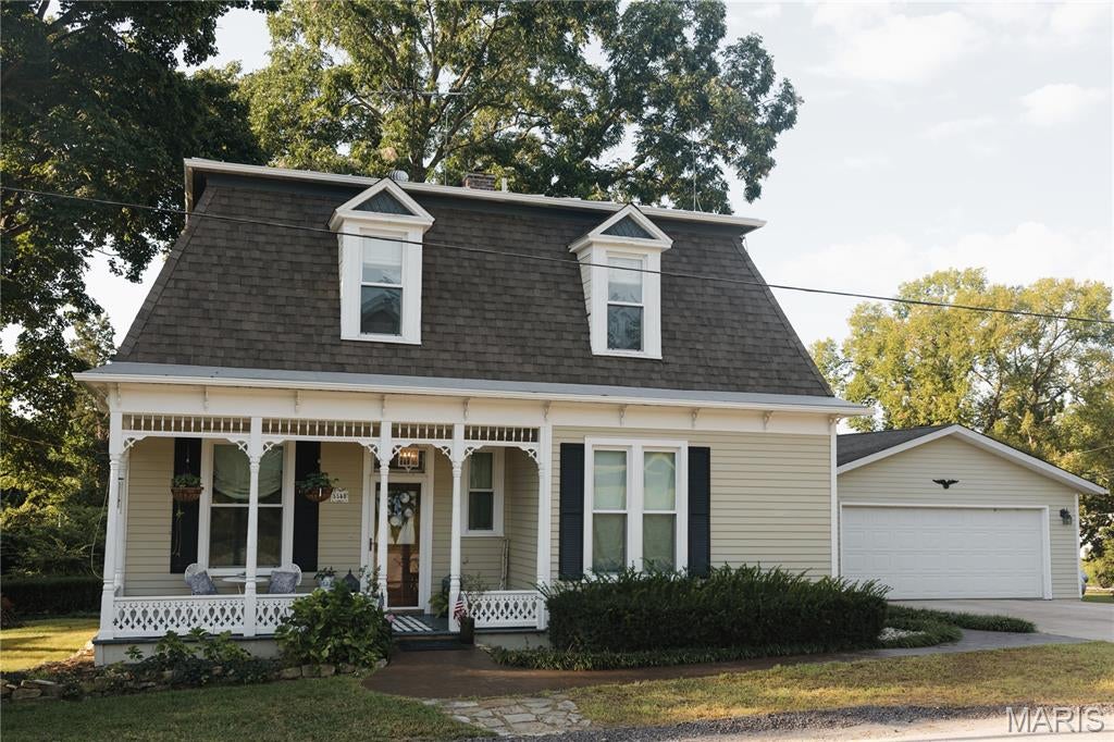 Accessible Augusta Living with Space, Character & Flexibility close from the town park and just two blocks from Augusta’s wineries, shops, restaurants, live music, and the Katy Trail, 5548 Chestnut St. offers the location buyers dream about—with three finished designer levels of living space to match. The home features a BRAND-NEW Mansard Roof and NEW gutters on both levels as well as a main-level primary suite with a beautifully renovated marble-tile bath, main-level laundry, flex areas, and a mudroom/sunroom with custom carpentry. Upstairs, discover a brand-new HVAC system and two generous bedrooms each with walk-in closets and a Jack-and-Jill bath—perfect for everyone, guests, or alternative space. The finished lower level provides a large family room, office/recreation space, dining area/game or craft space, and abundant storage. A brand new large hot water heater added in 2026. A detached two-car garage and prominent corner lot provide even more value along with successful blackberry bushes, herb gardens, and room to grow. Throughout this character rich home are refinished pine hardwood floors, built-in cabinetry, and modern updates which add to the historic character charm without the headache. Find three finished levels with an elevated design. Two fully renovated bathrooms. Two plus car garage. Prime accessible location. Everyday a getaway. Bike the trail. Bike to Klondike. Close to dinner. Close to the park. Close to school. Close to live music. Community! Dreams come true.